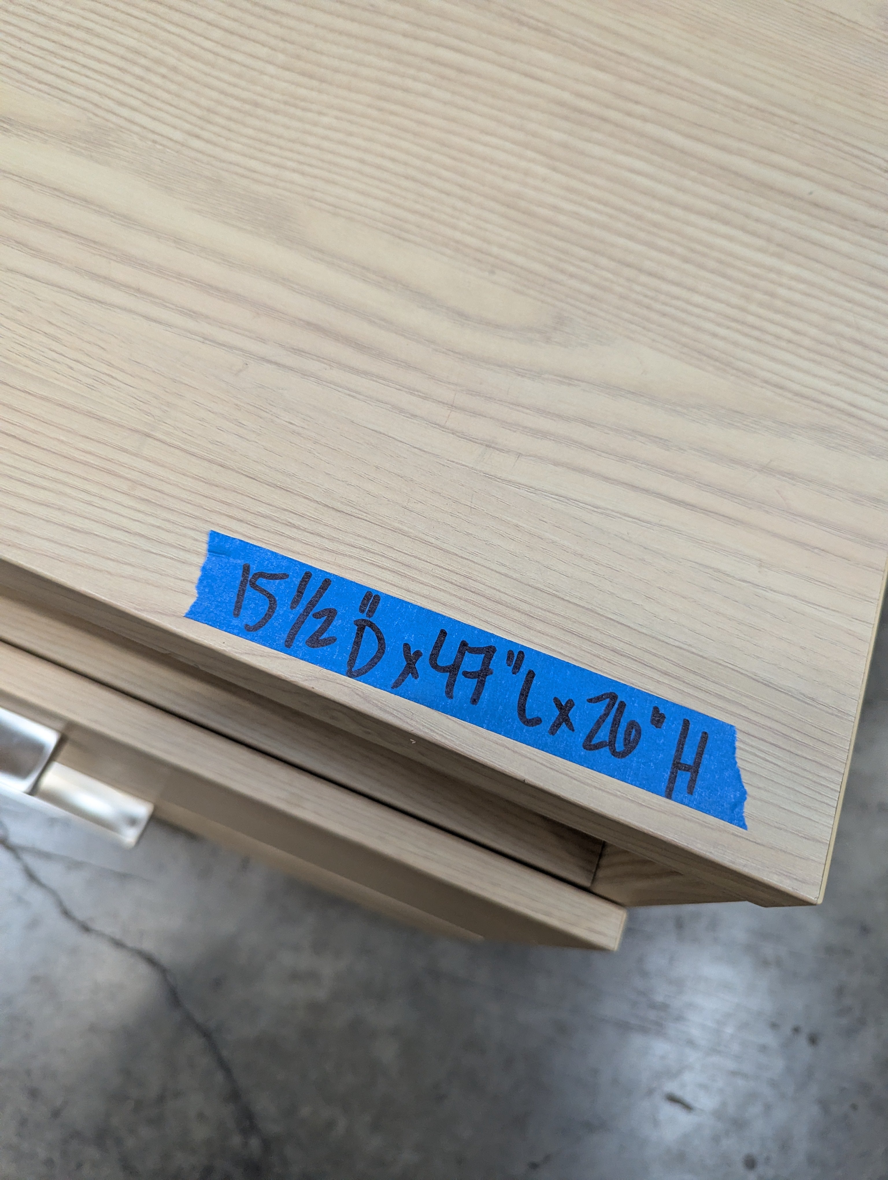 Modern Blonde Wood Four-Drawer Dresser with Open Media Storage