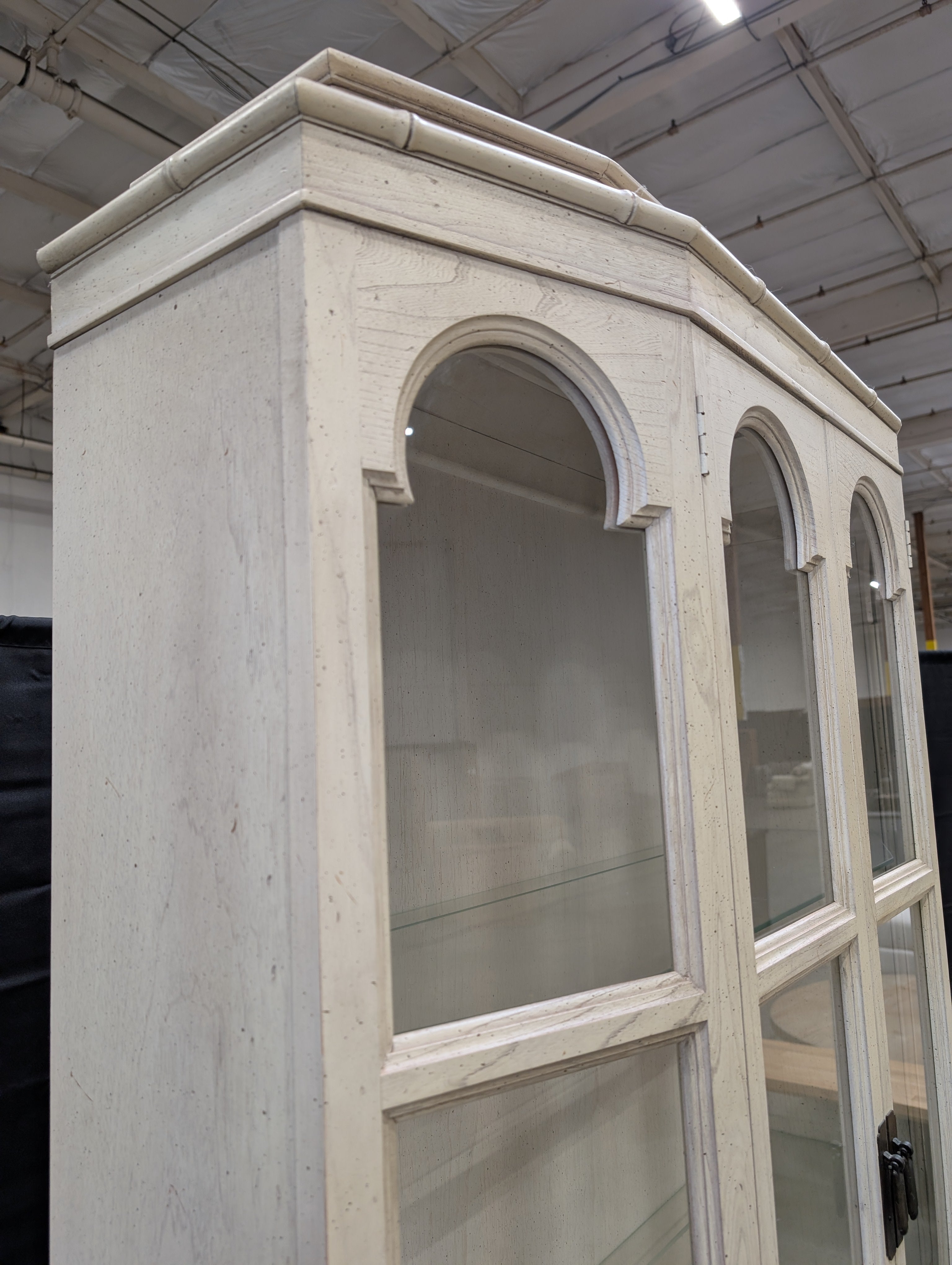 Distressed White Wood Display Hutch with Arched Glass Doors