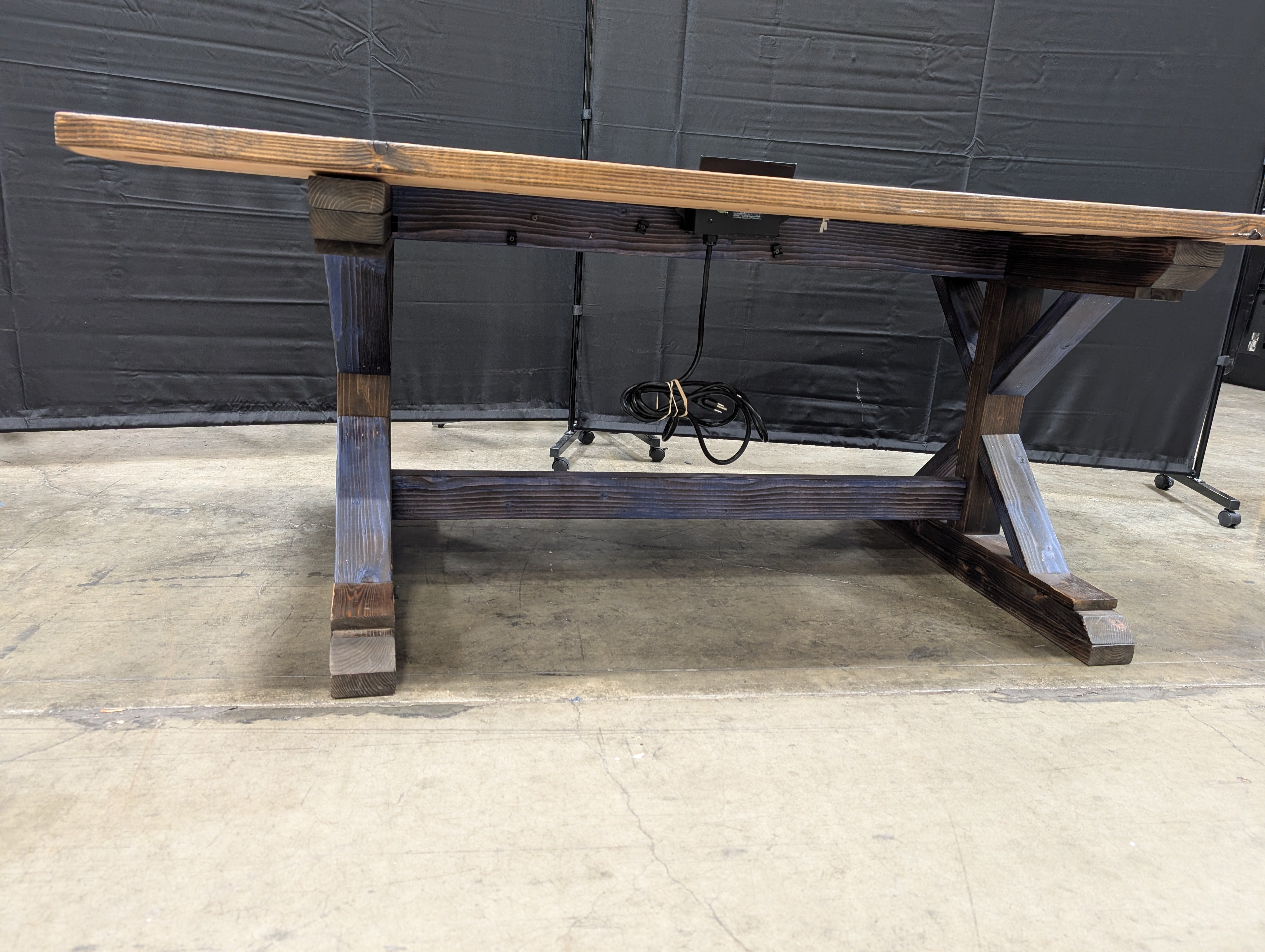 Rustic Solid Wood Trestle Table with Integrated Power Module
