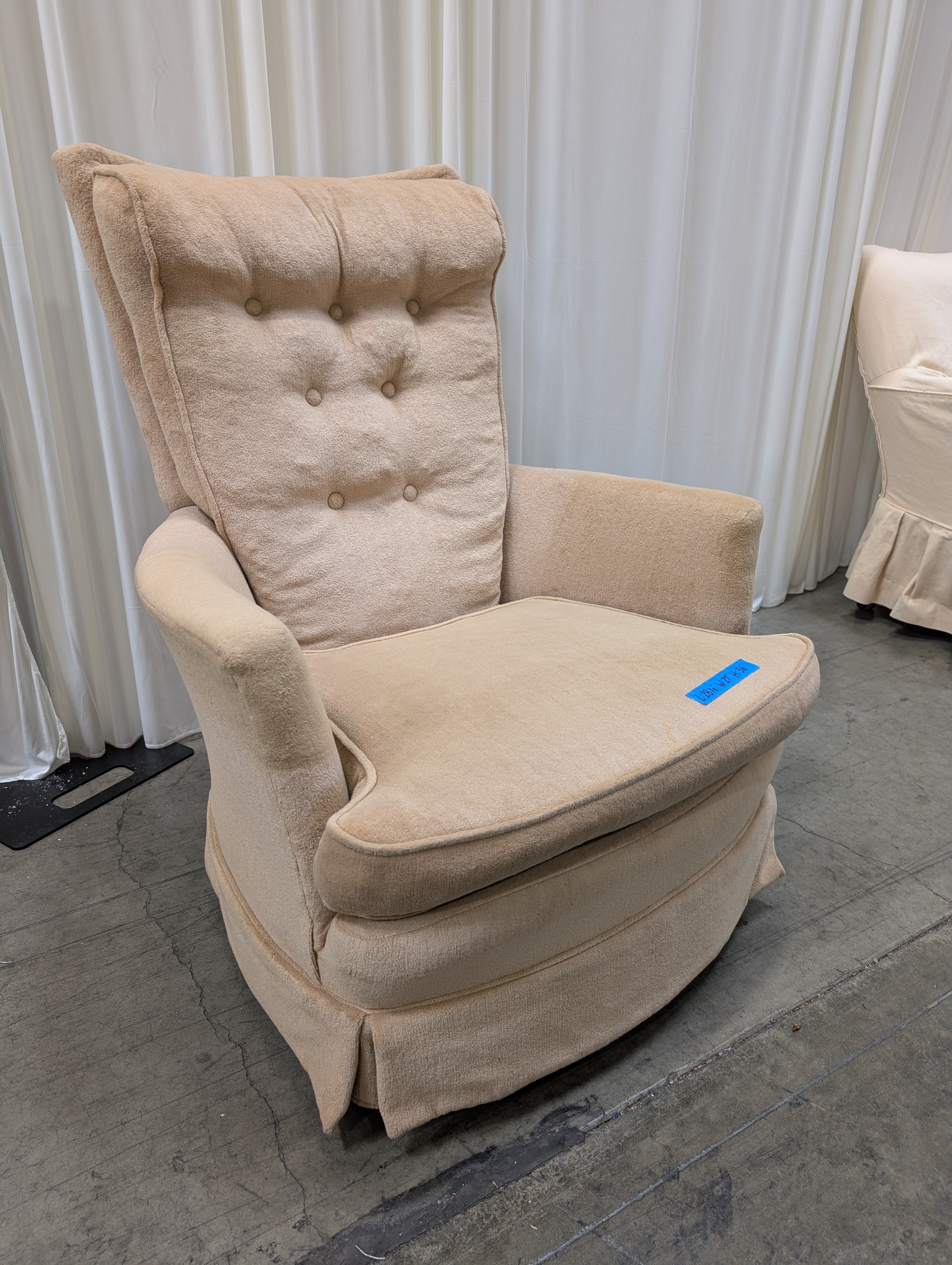 Peach Tufted Fabric Recliner with Skirted Base