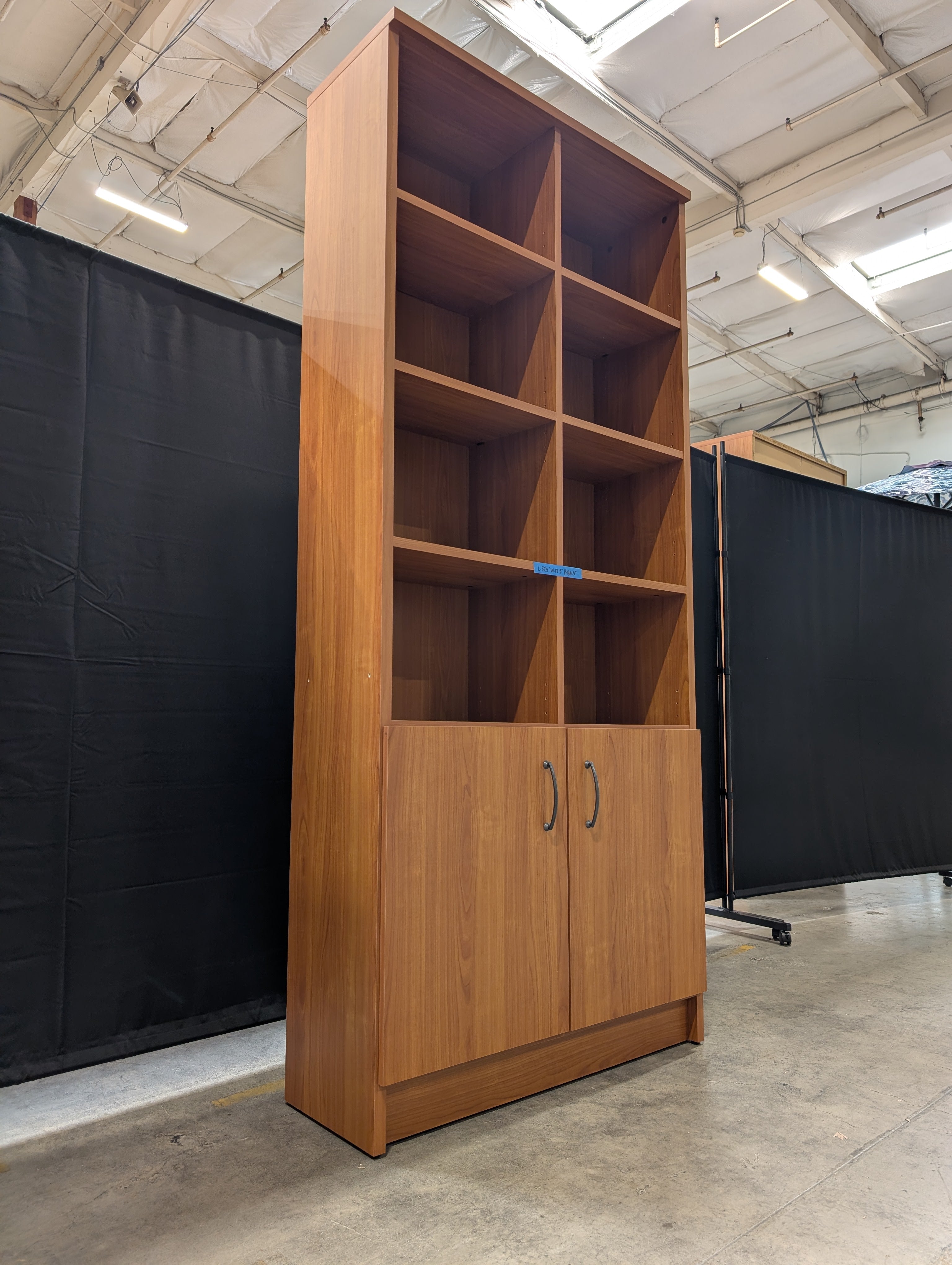 Cherry Wood Tone Multi-Section Bookcase with Lower Cabinet