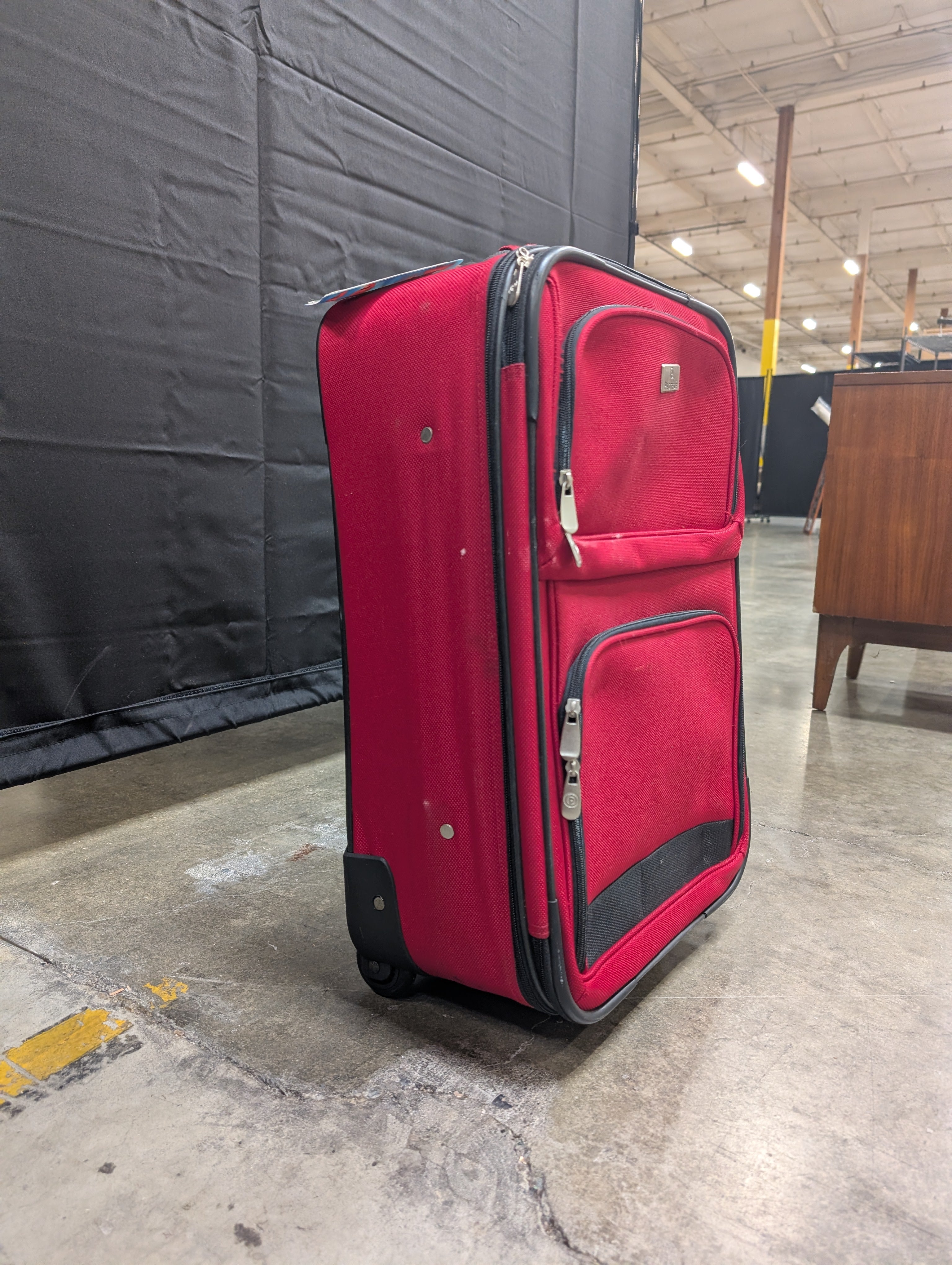 Red Softshell Rolling Suitcase with Exterior Pockets