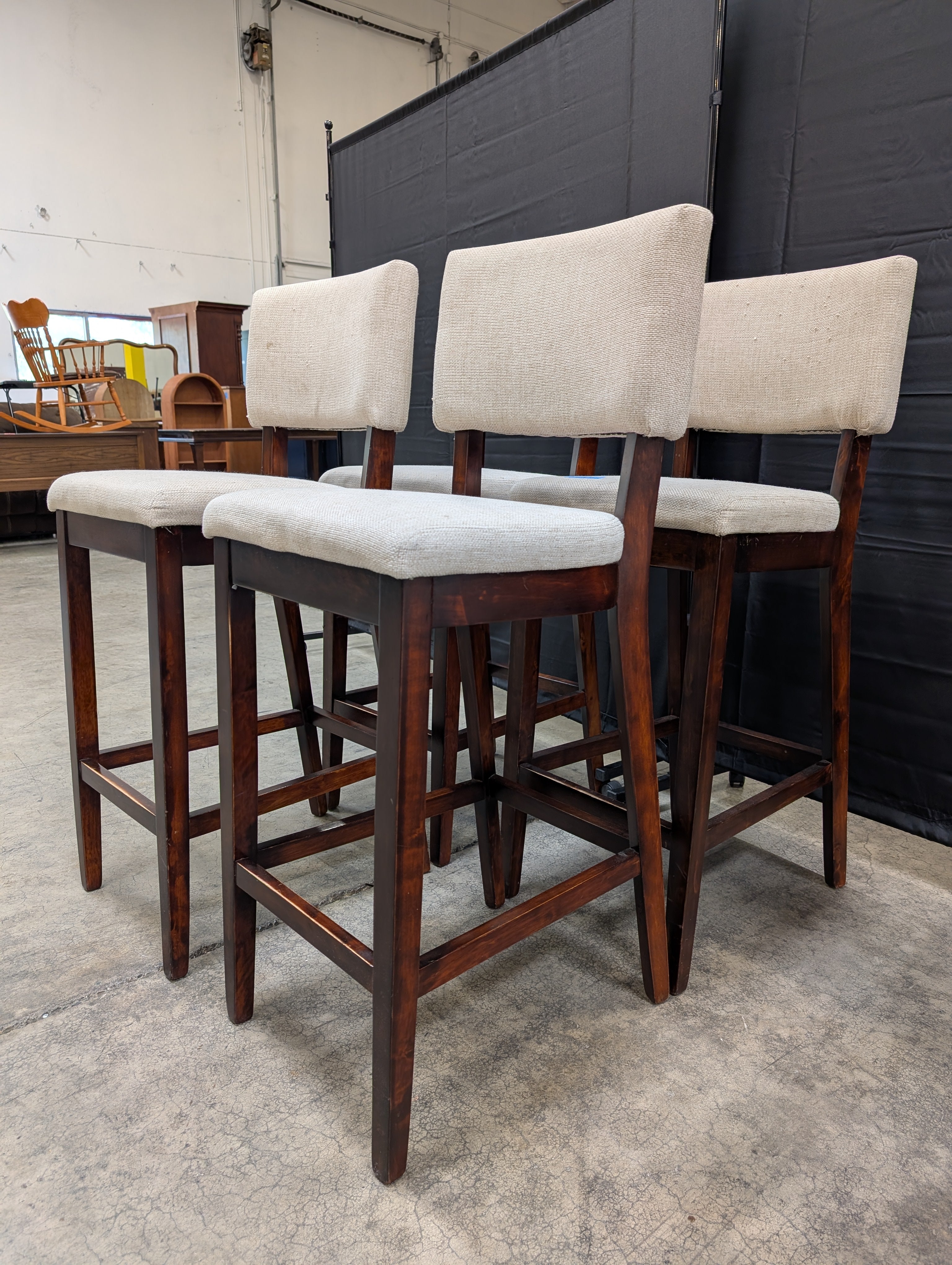 Set of Four Beige Fabric Upholstered Bar Height Dark Wood Dining Chairs