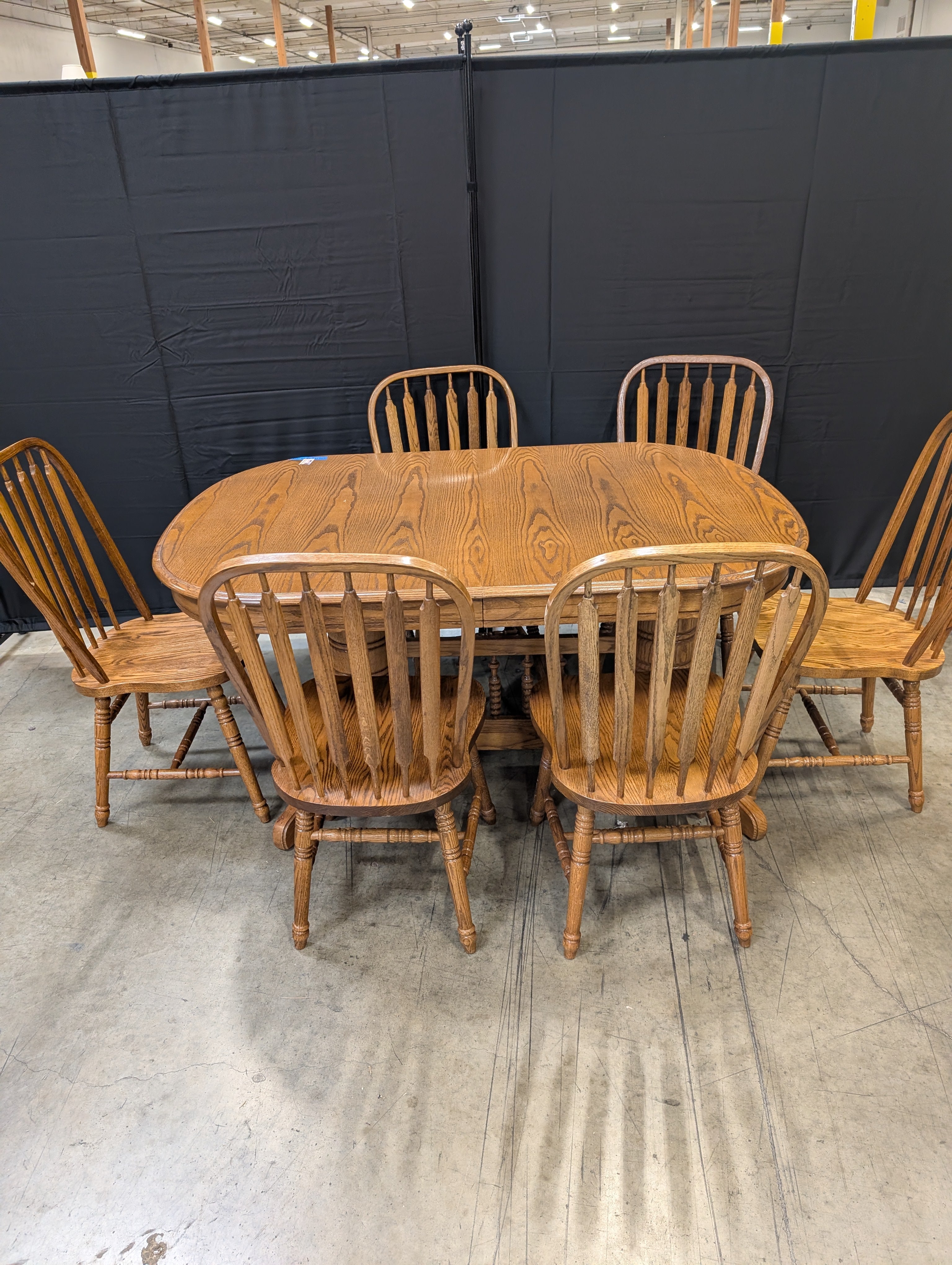 Oak Finish Dining Table with Six  Spindle Back Chairs