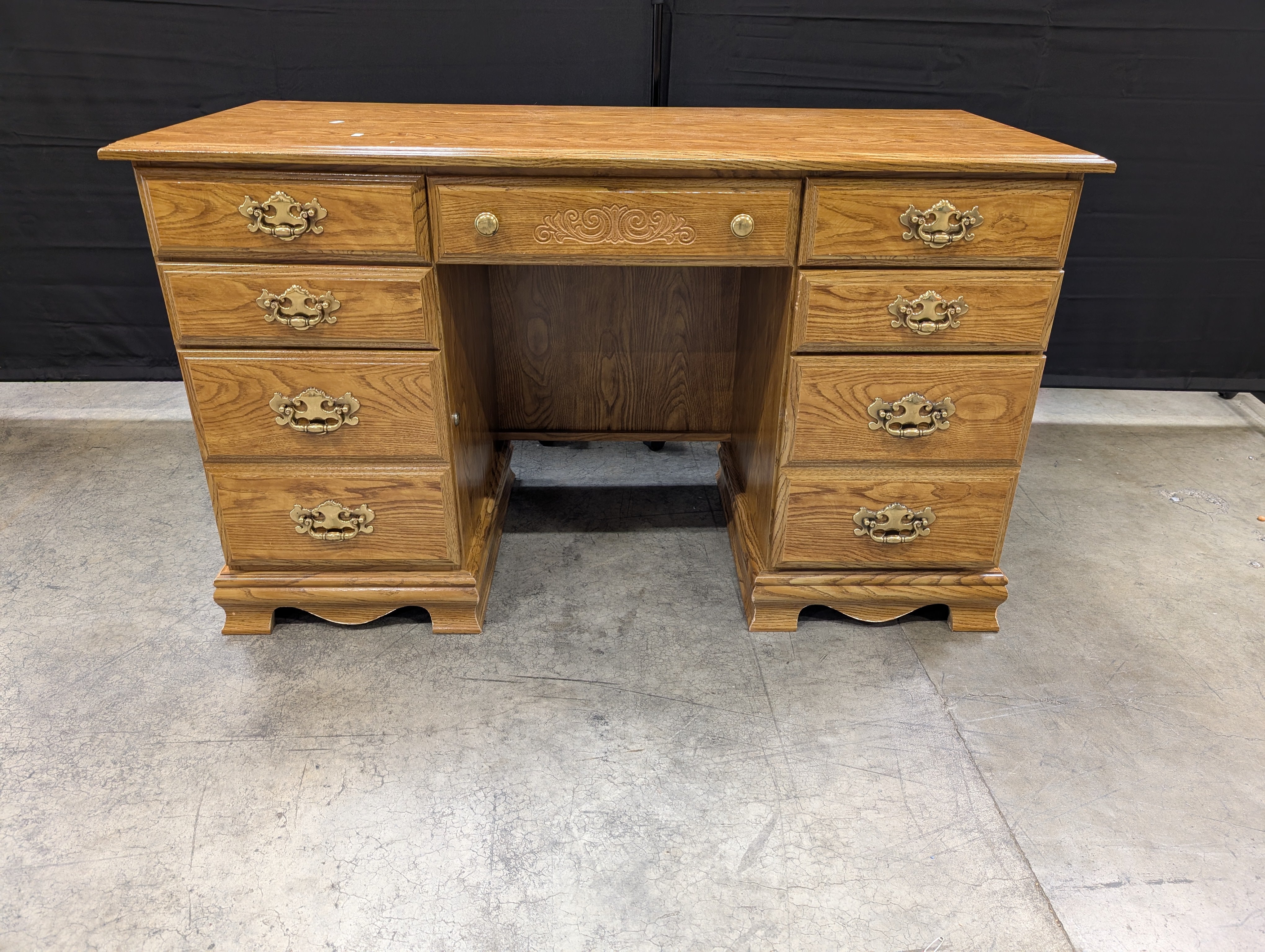 Traditional Oak Finish Pedestal Desk with Brass Pulls