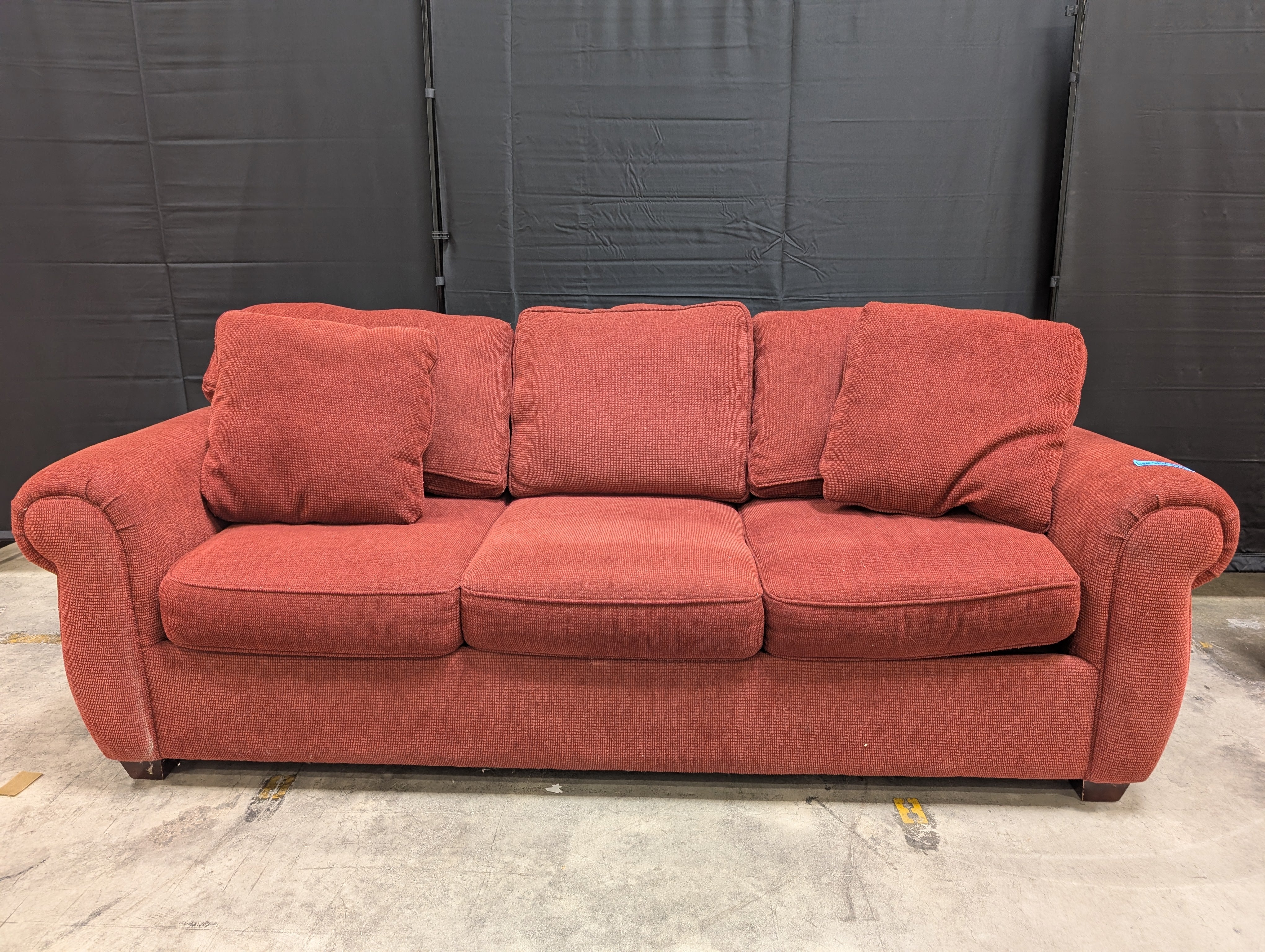 Red Textured Fabric Couch with Rolled Arms
