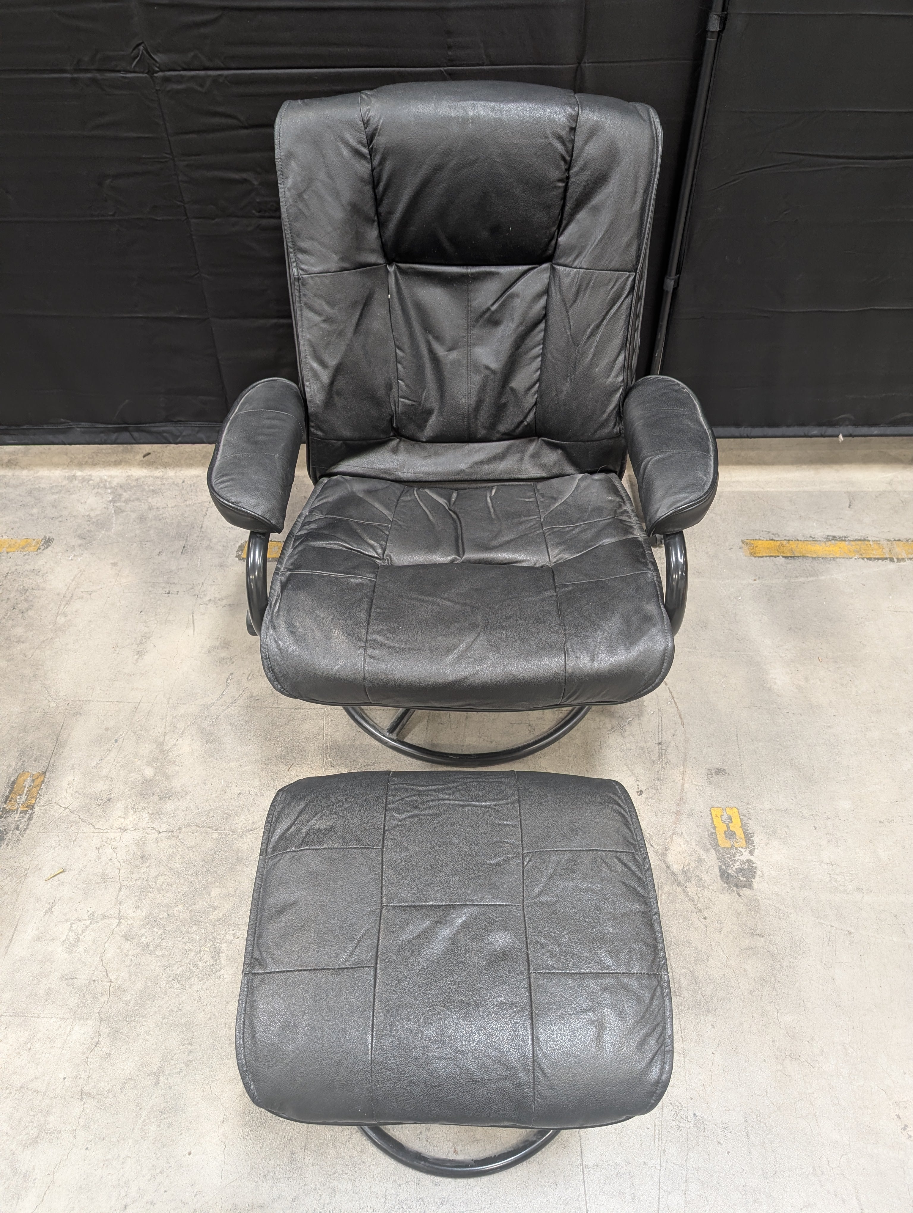 Padded Black Recliner with Ottoman