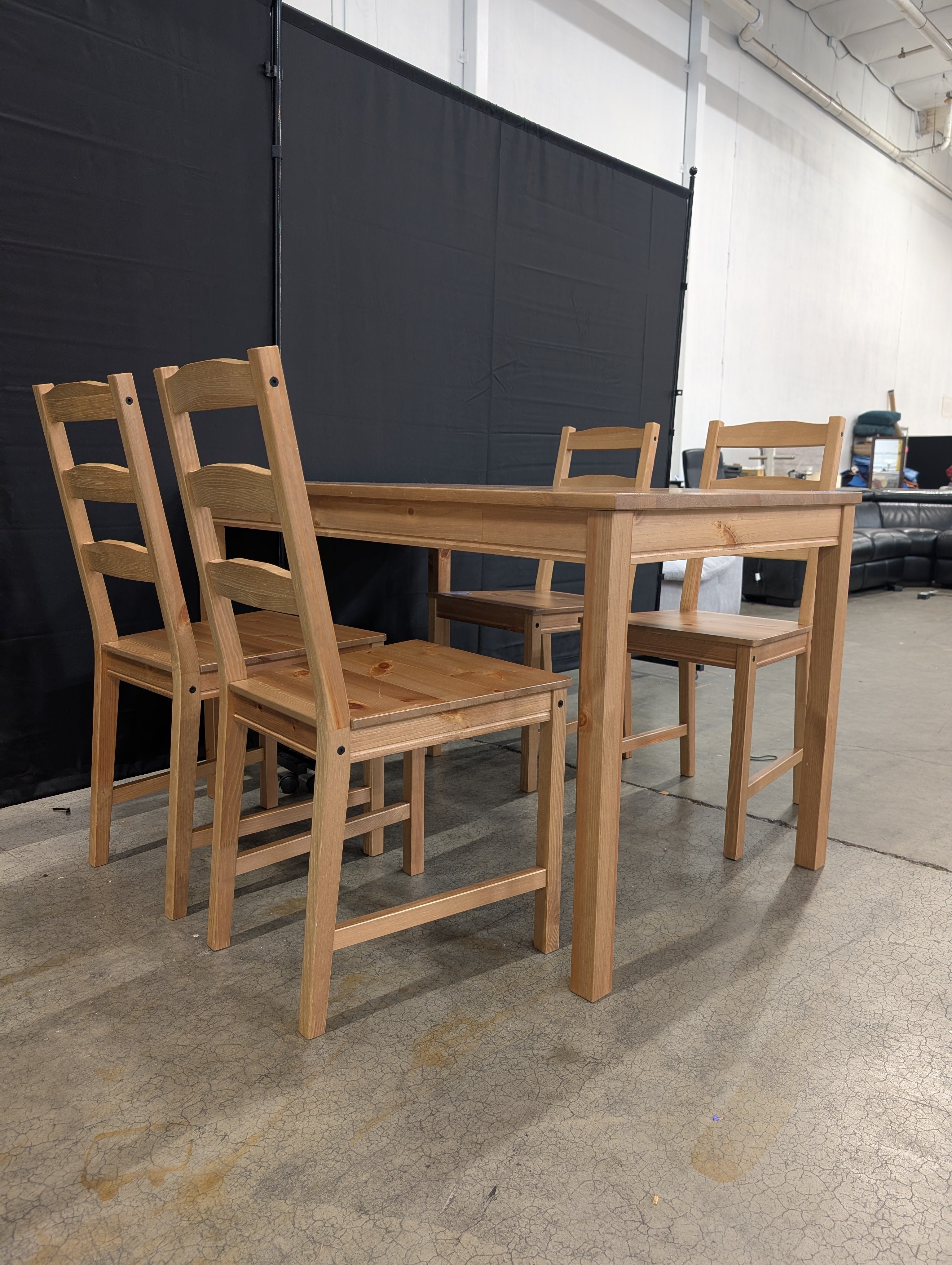 Natural Wood Plank Dining Table with Four Ladder Back Chairs