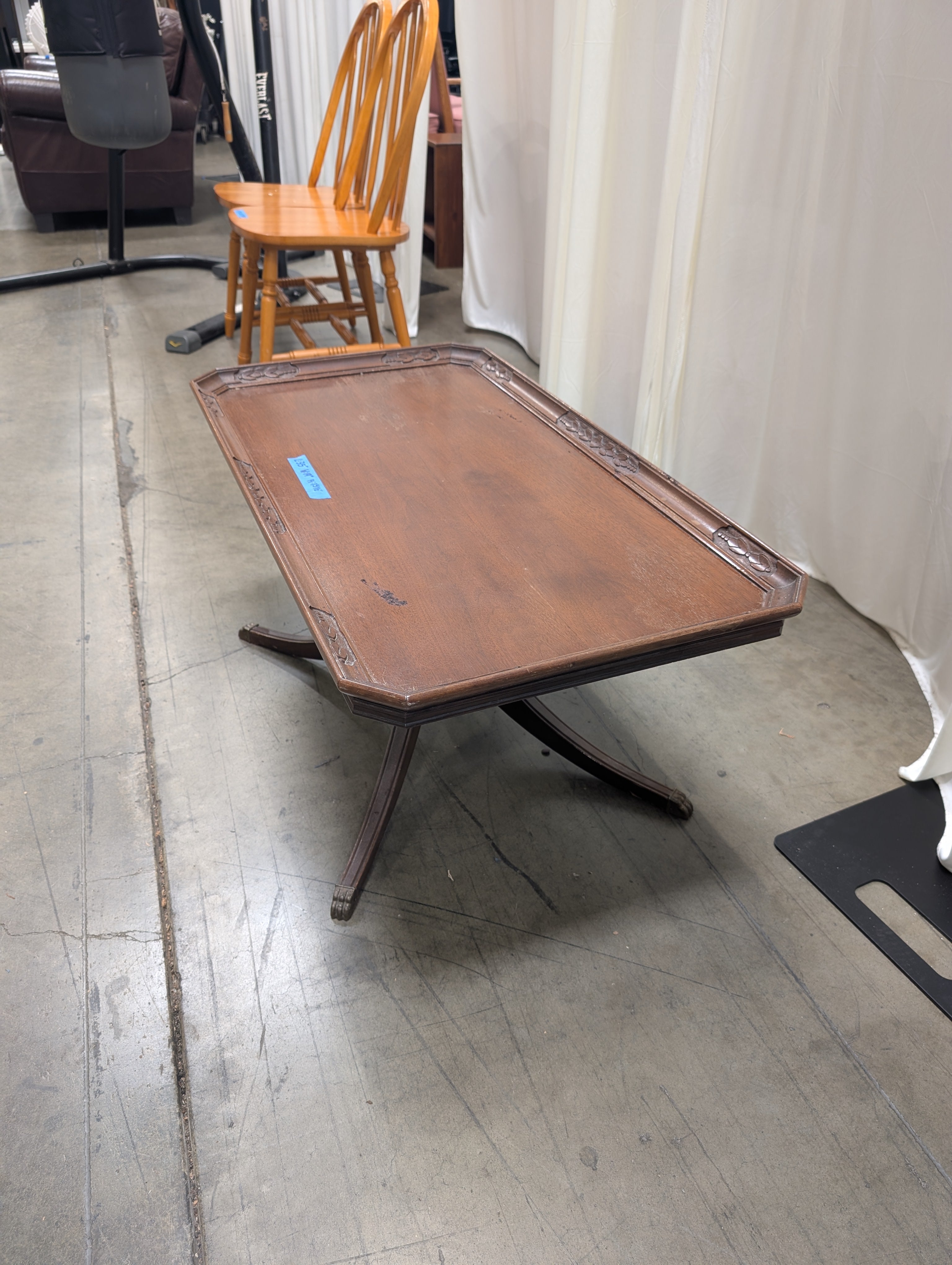 Carved Wood Coffee Table with Glass Insert