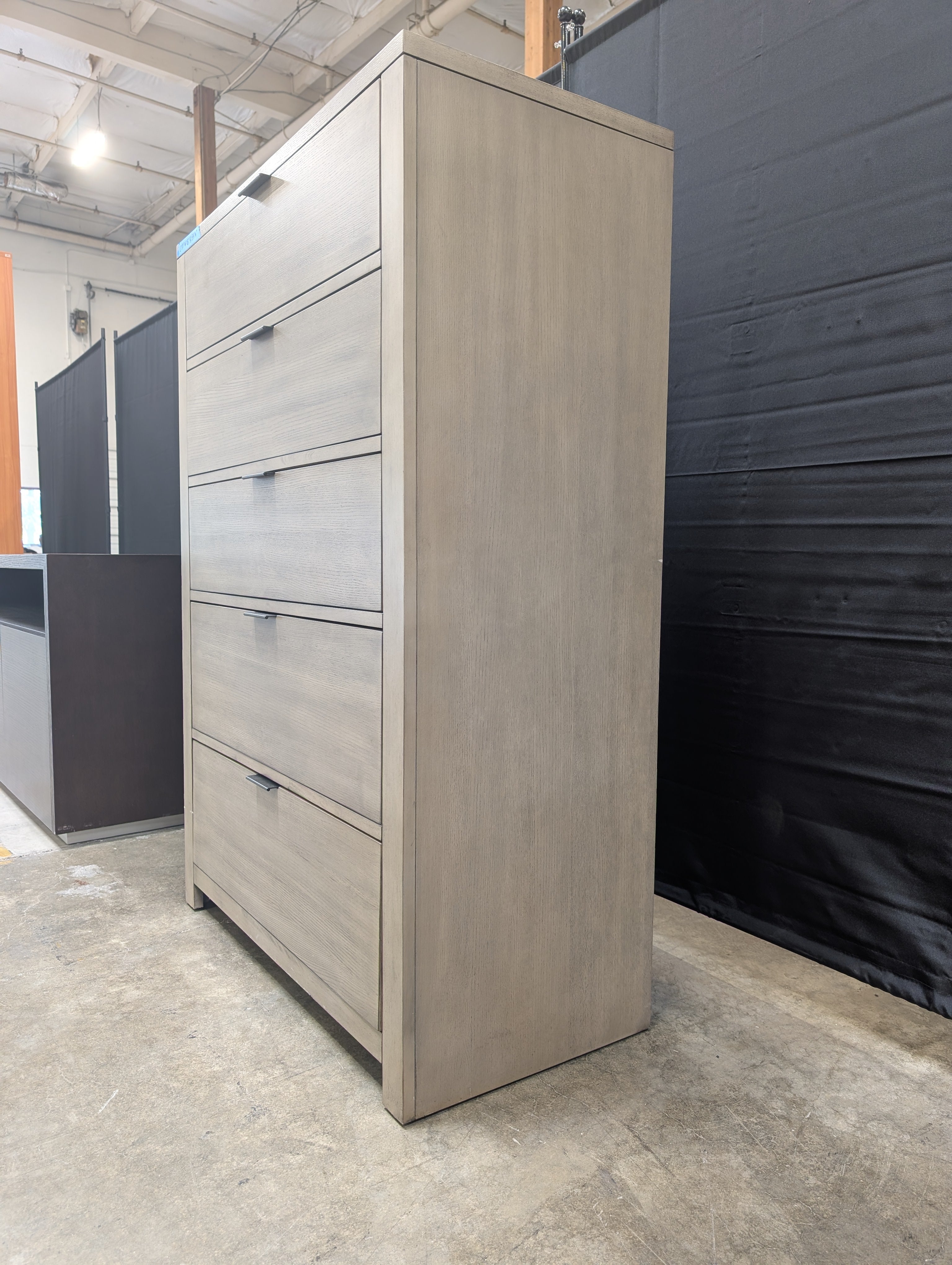 Grey Wood Five-Drawer Dresser with Metal Pulls