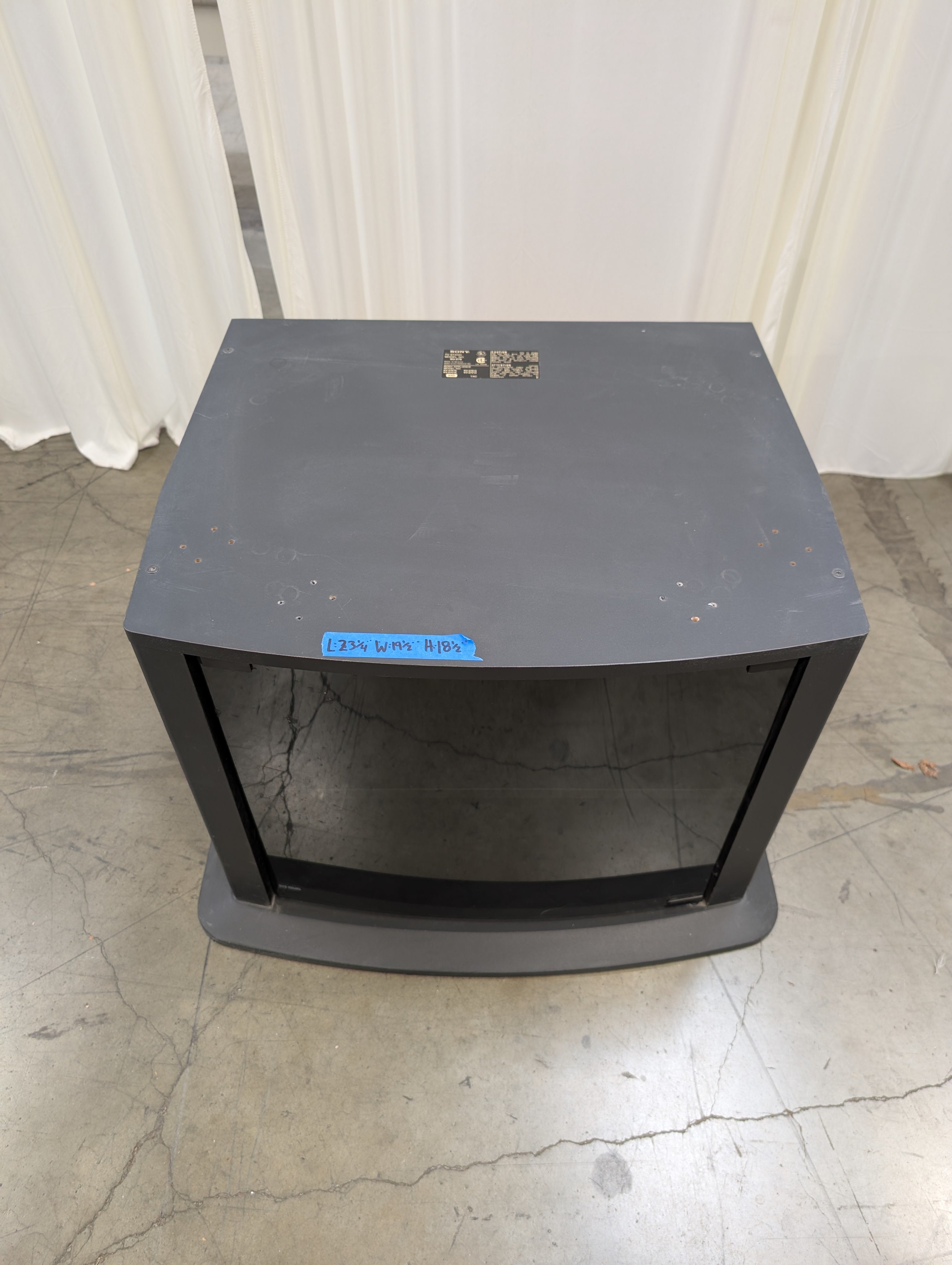 Curved Black Glass TV Stand with Tinted Door