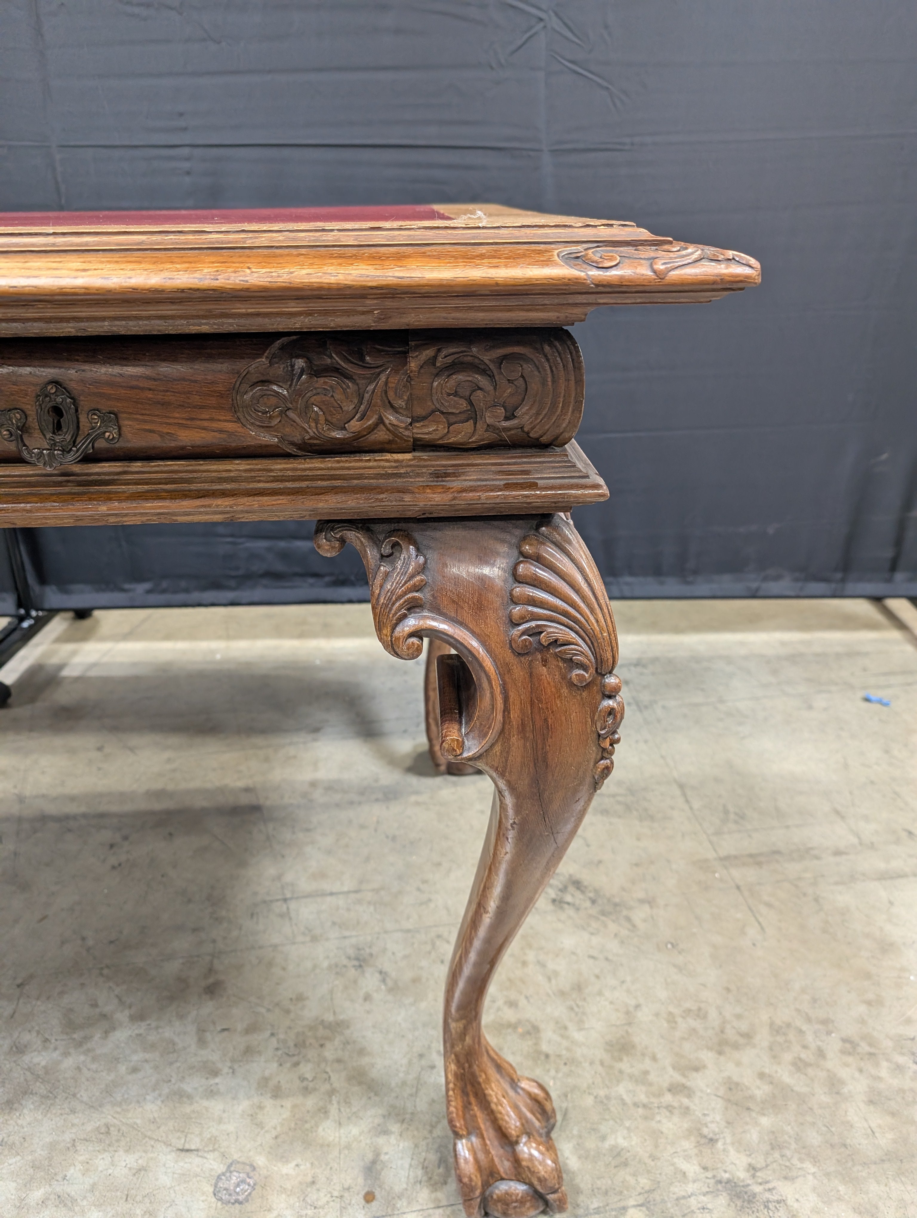 Ornate Carved Wood Desk with Reddish-Brown Top