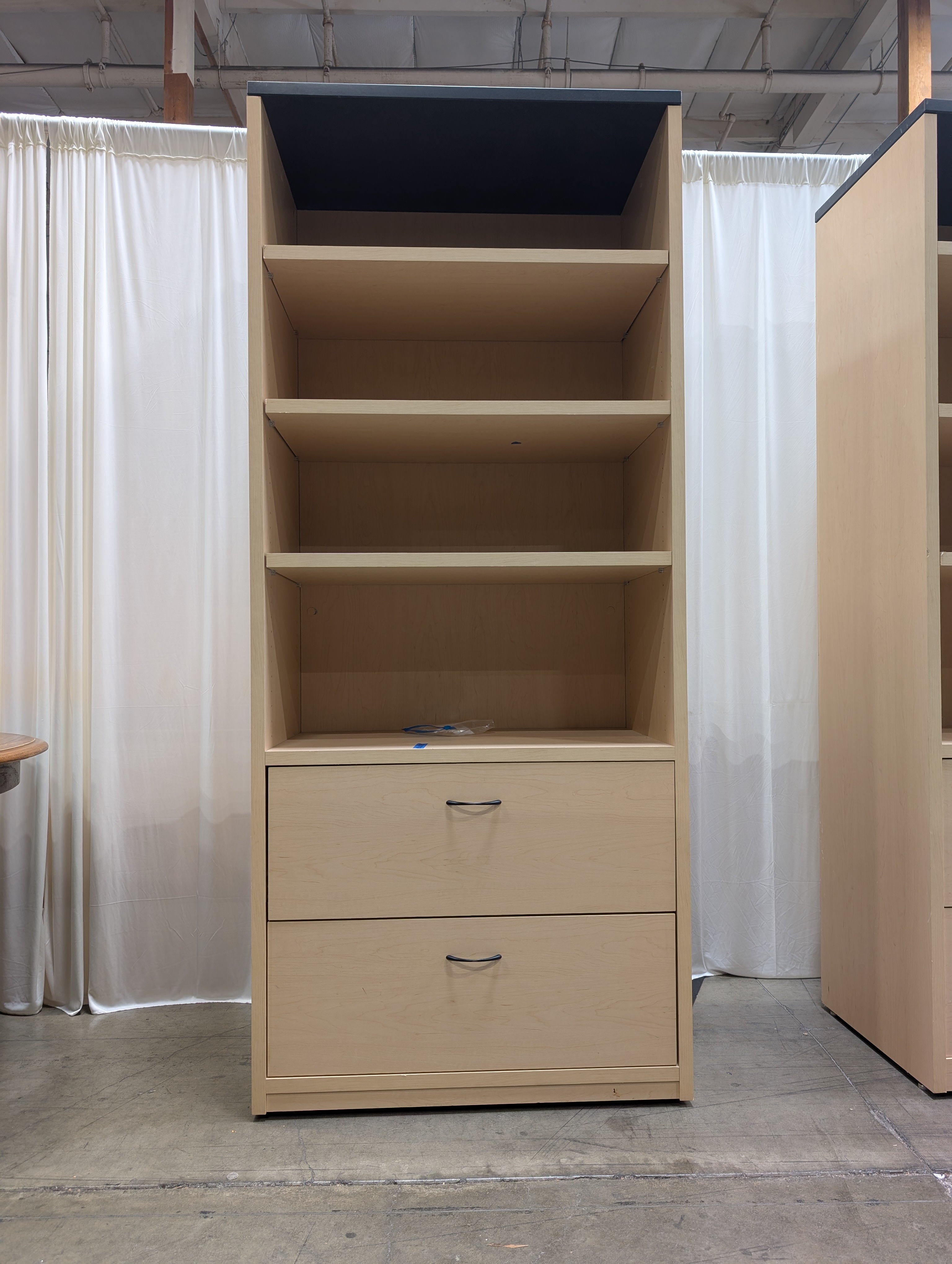 Light Wood Three-Shelf Bookcase with Two Drawers