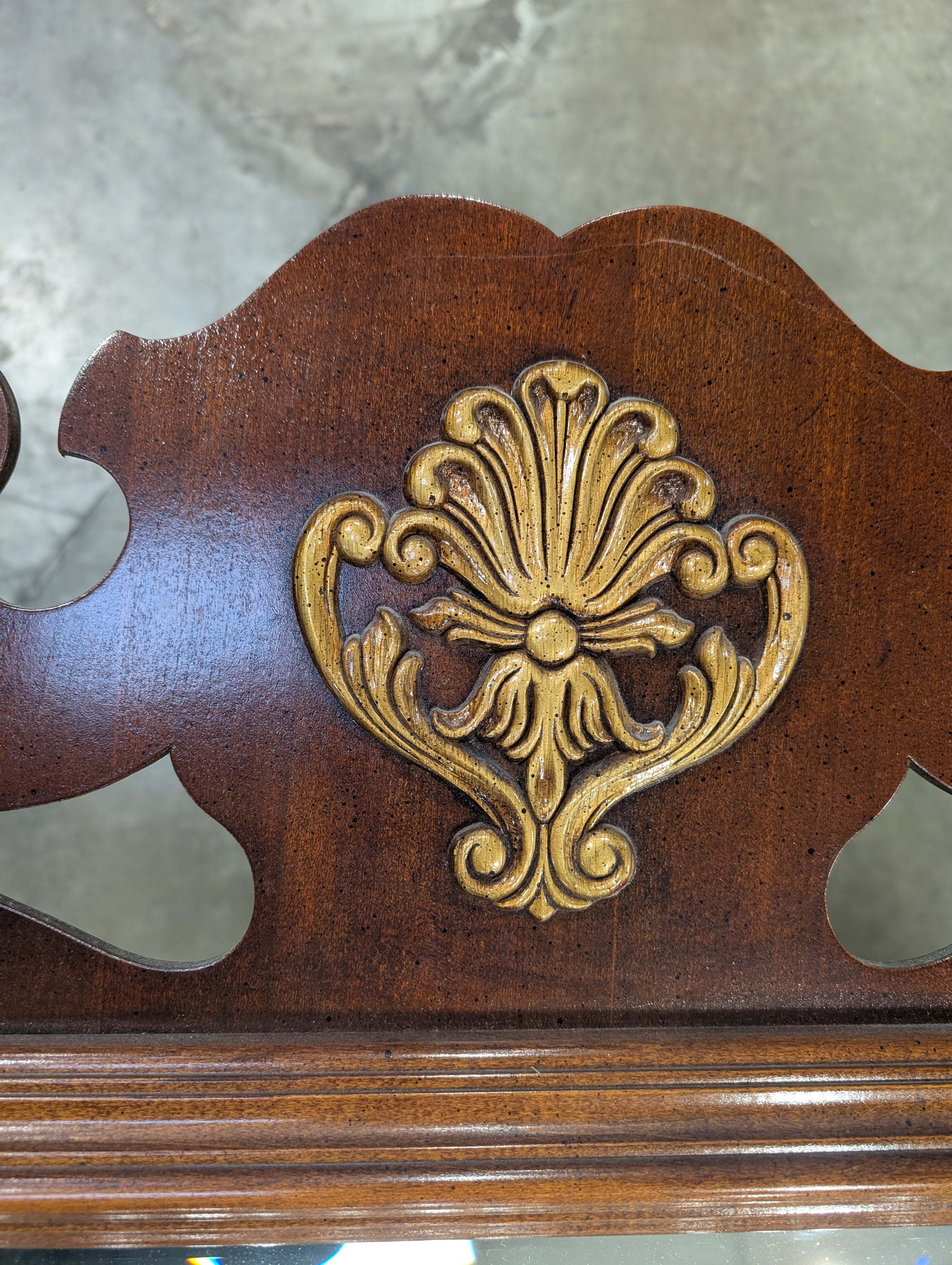 Ornate Scrolled Dark Wood Wall Mirror with Gilded Shell Accent
