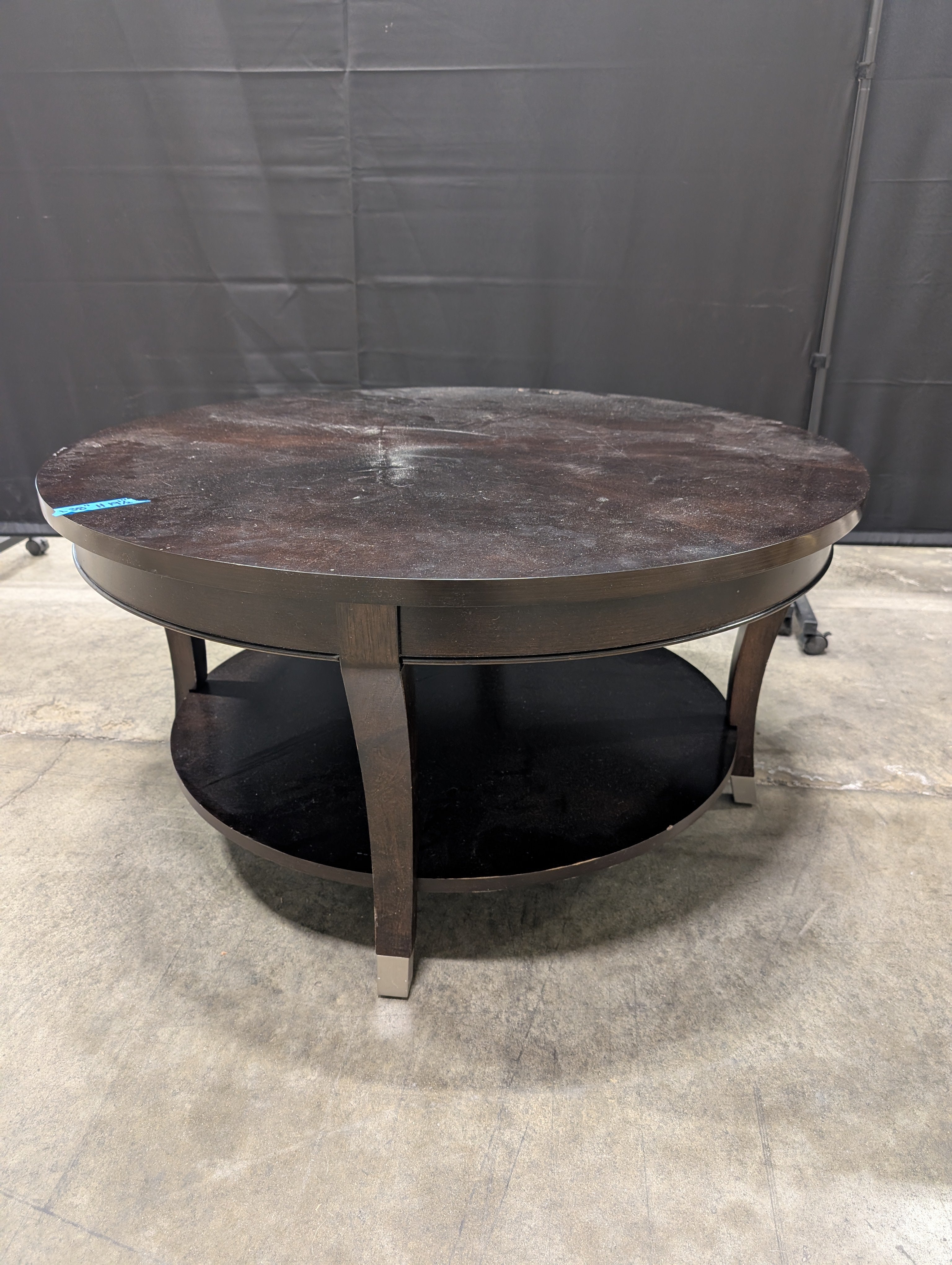 Contemporary Dark Wood Round Coffee Table with Lower Shelf