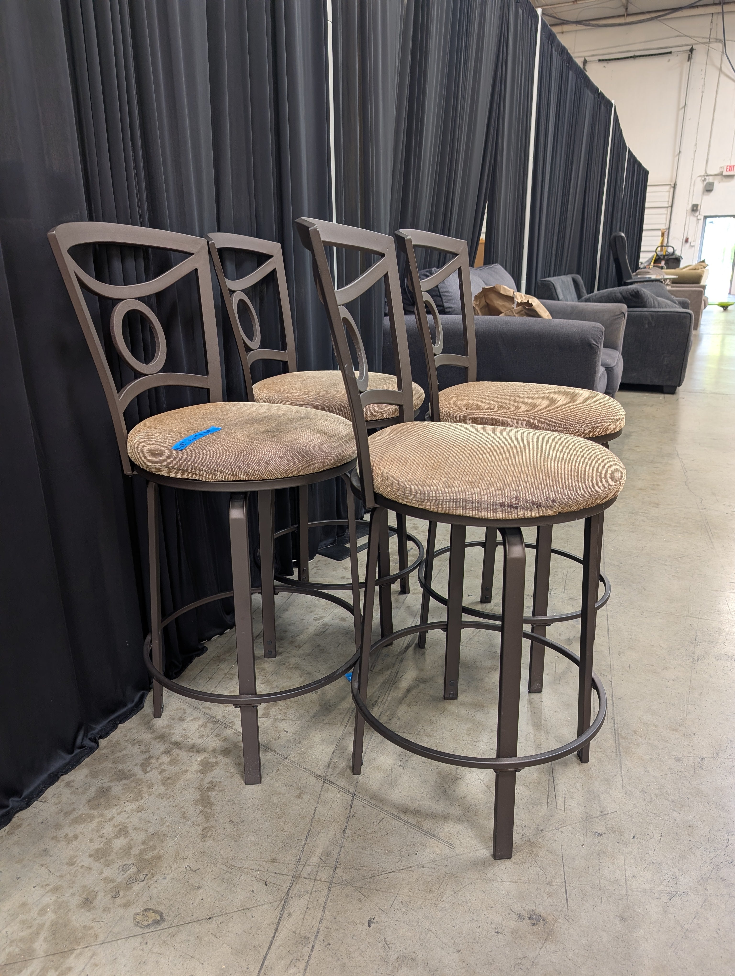 Set of Four Tan Upholstered Swivel Bar Stool in Dark Metal