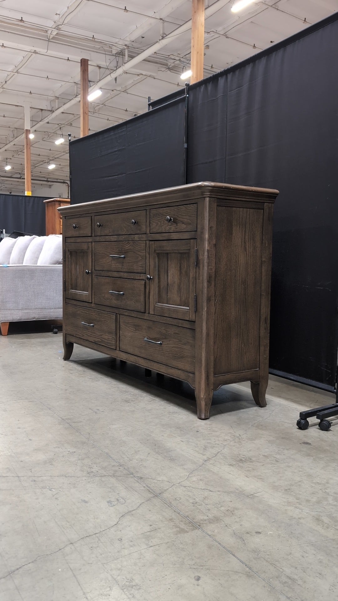 Spacious Dark Wood Magnussen Home Dresser with Varied Storage