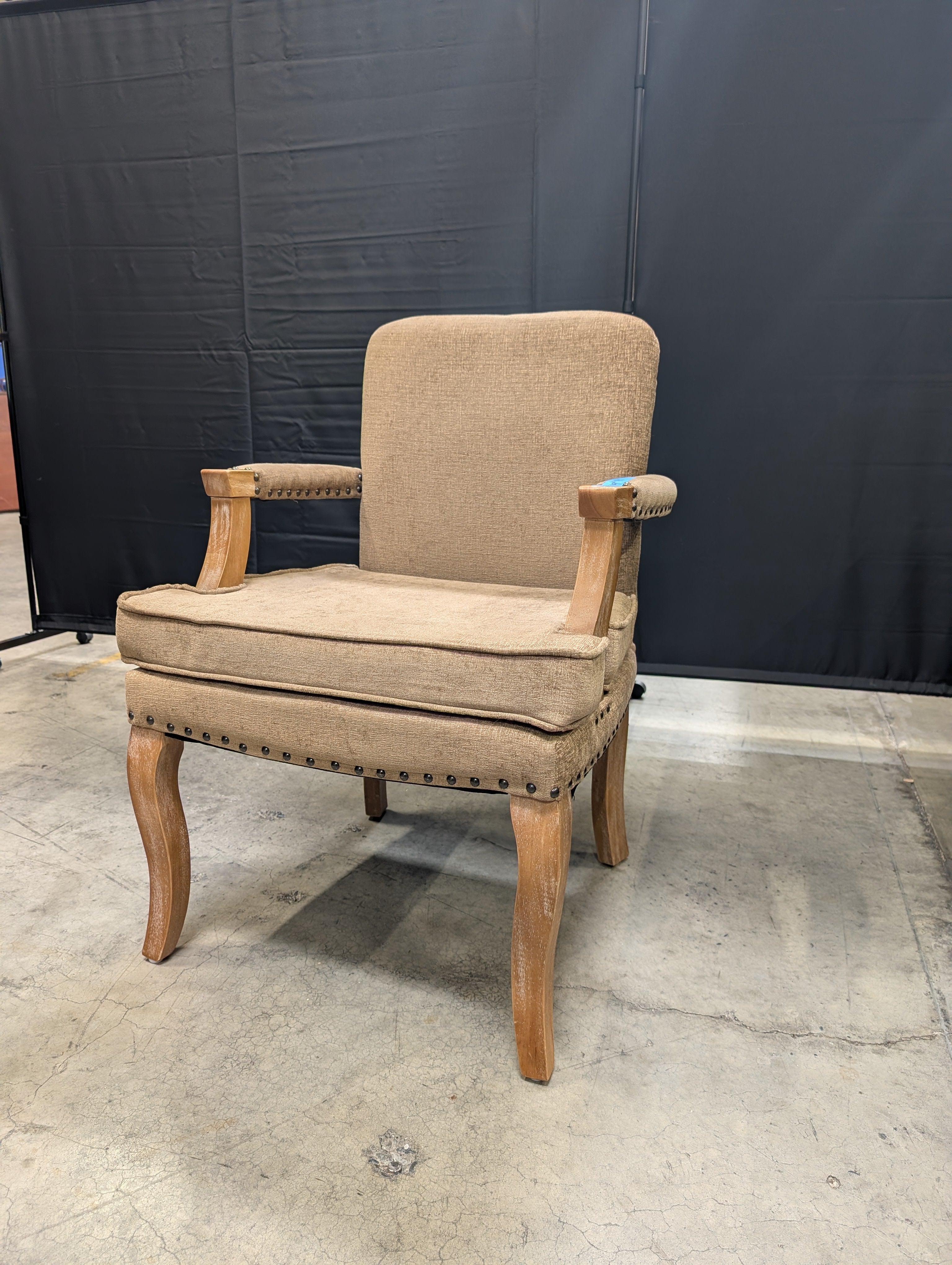 Traditional Upholstered Armchair with Carved Wood Accents
