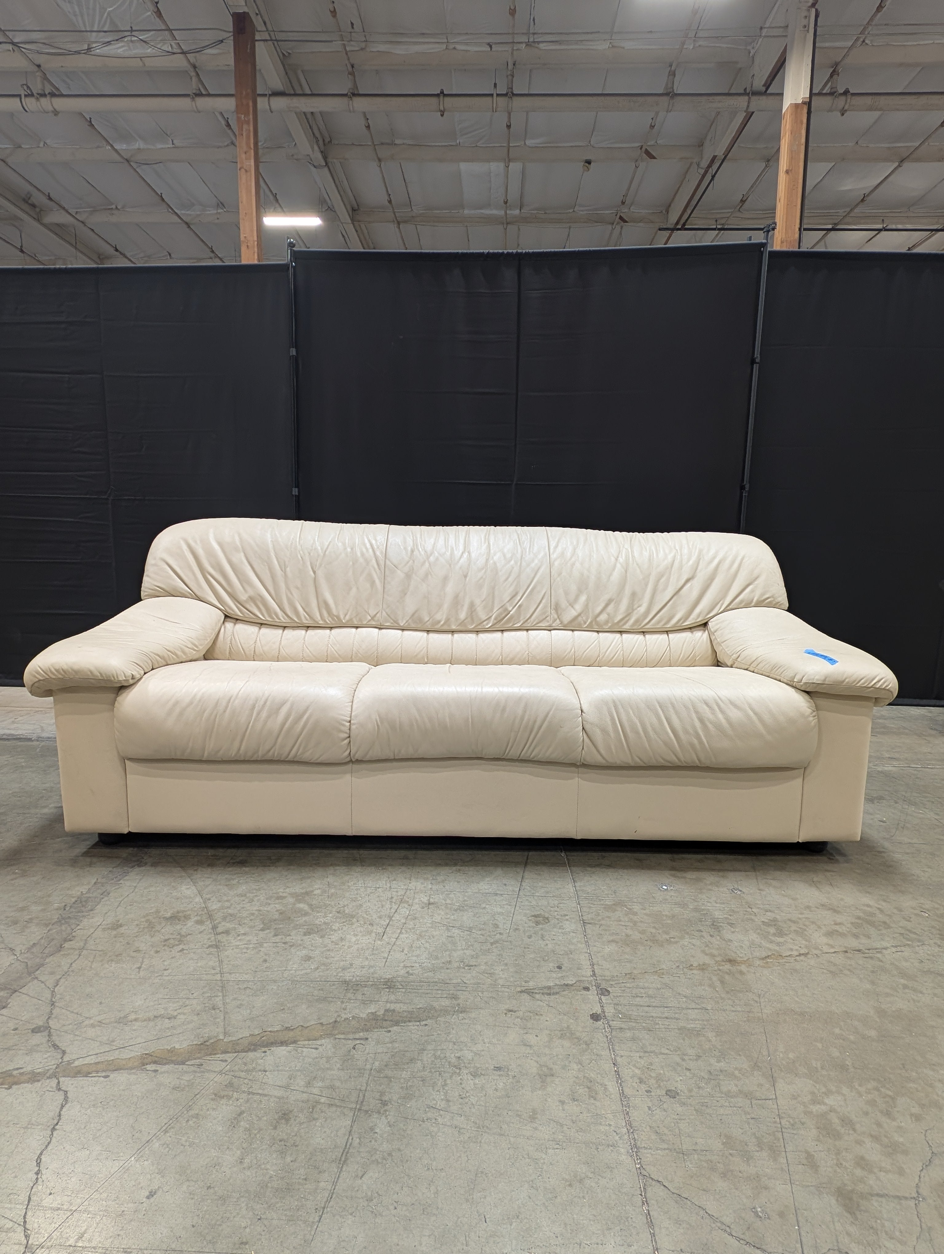 Cream Natuzzi Three-Seater Upholstered Sofa