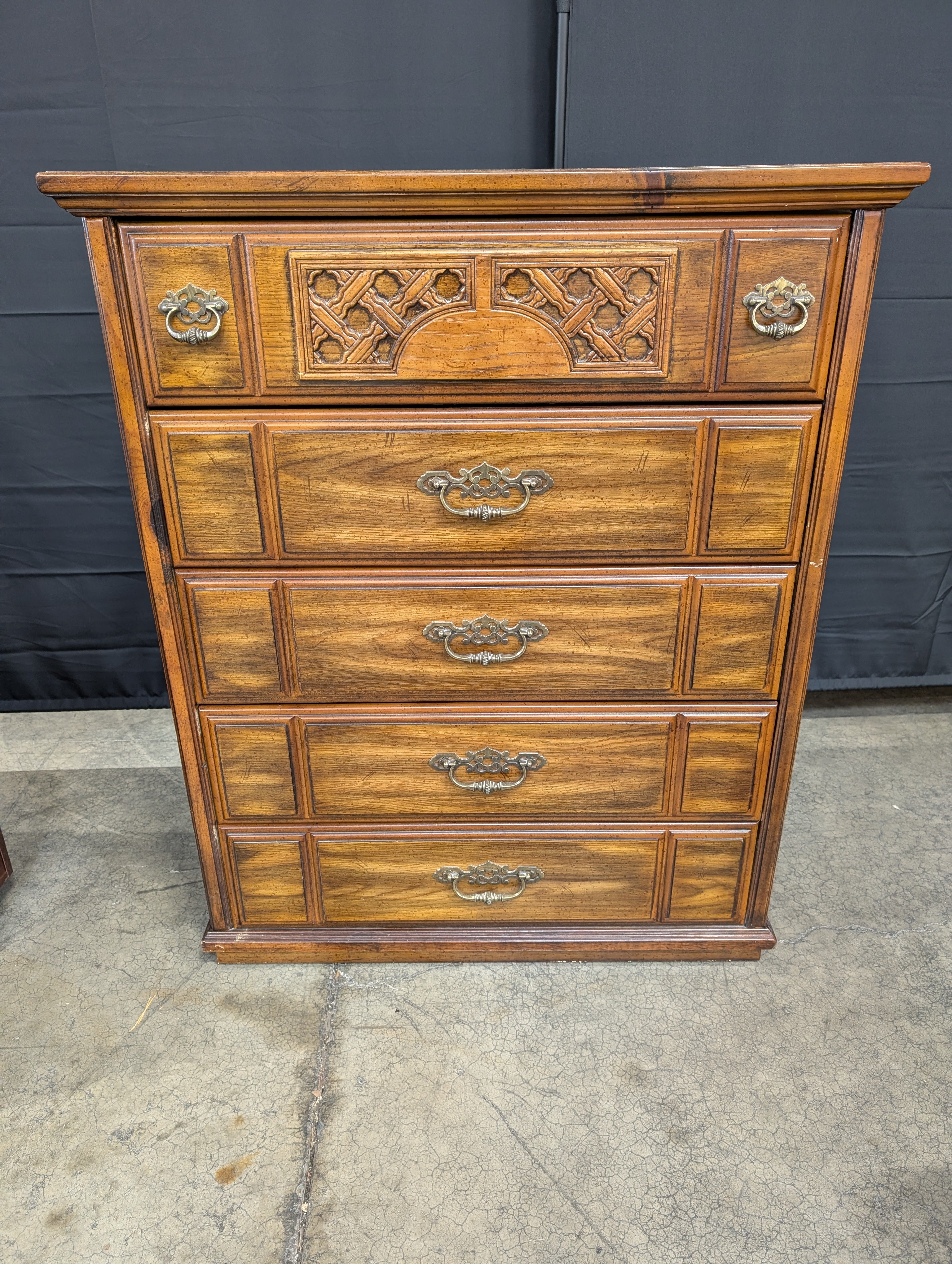 Traditional Dark Wood Five-Drawer Chest with Ornate Pulls