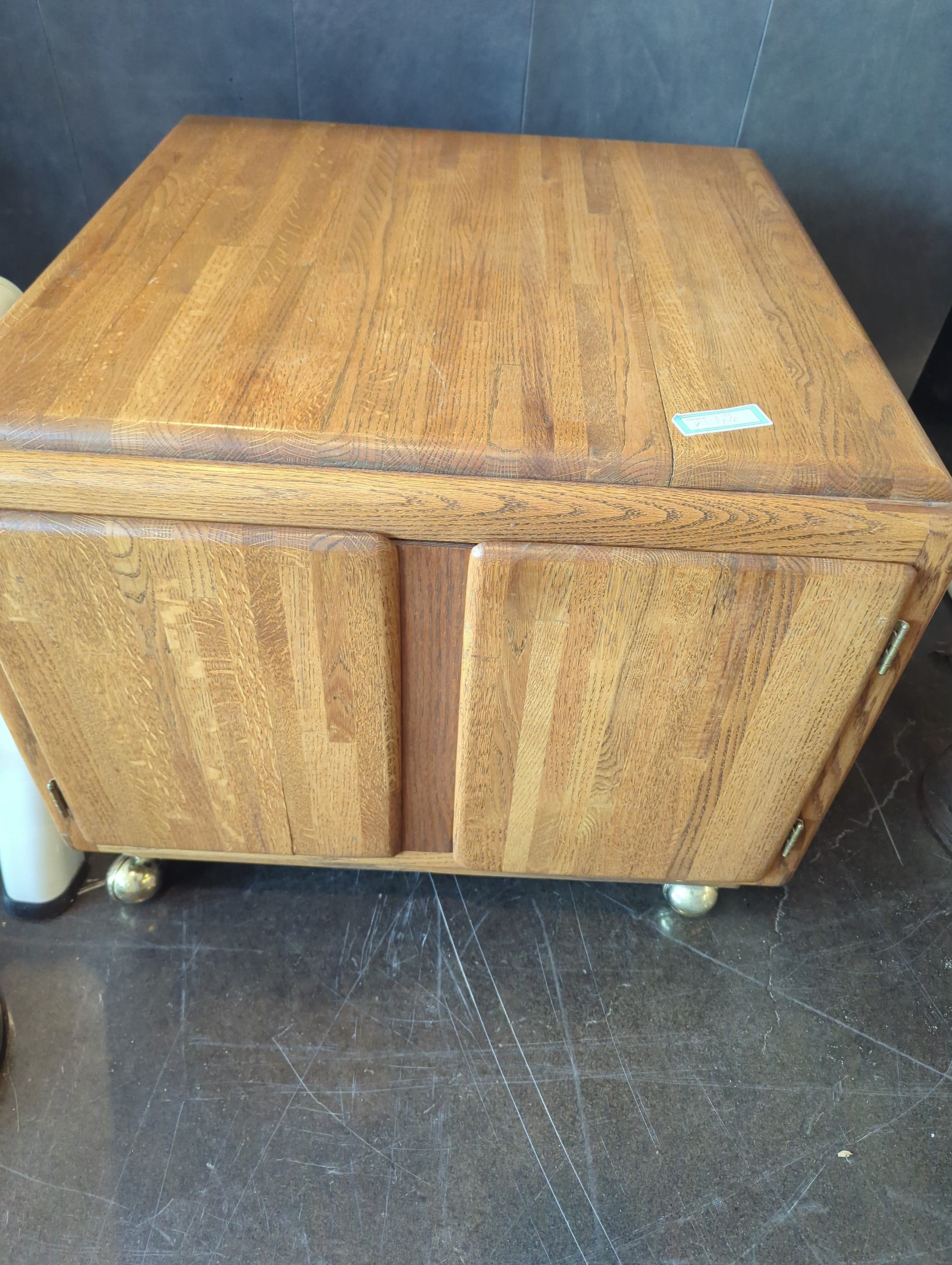 Large MCM end table on wheels