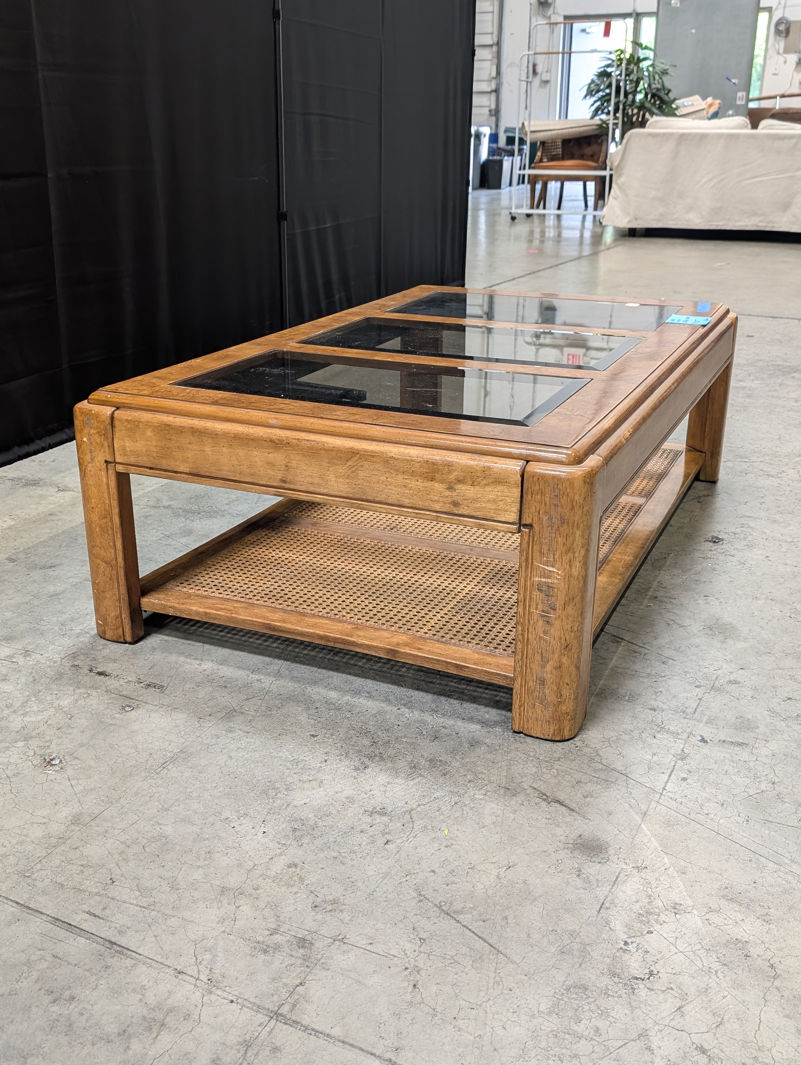 Vintage Style Burled Wood Coffee Table with Glass Top and Cane Accents