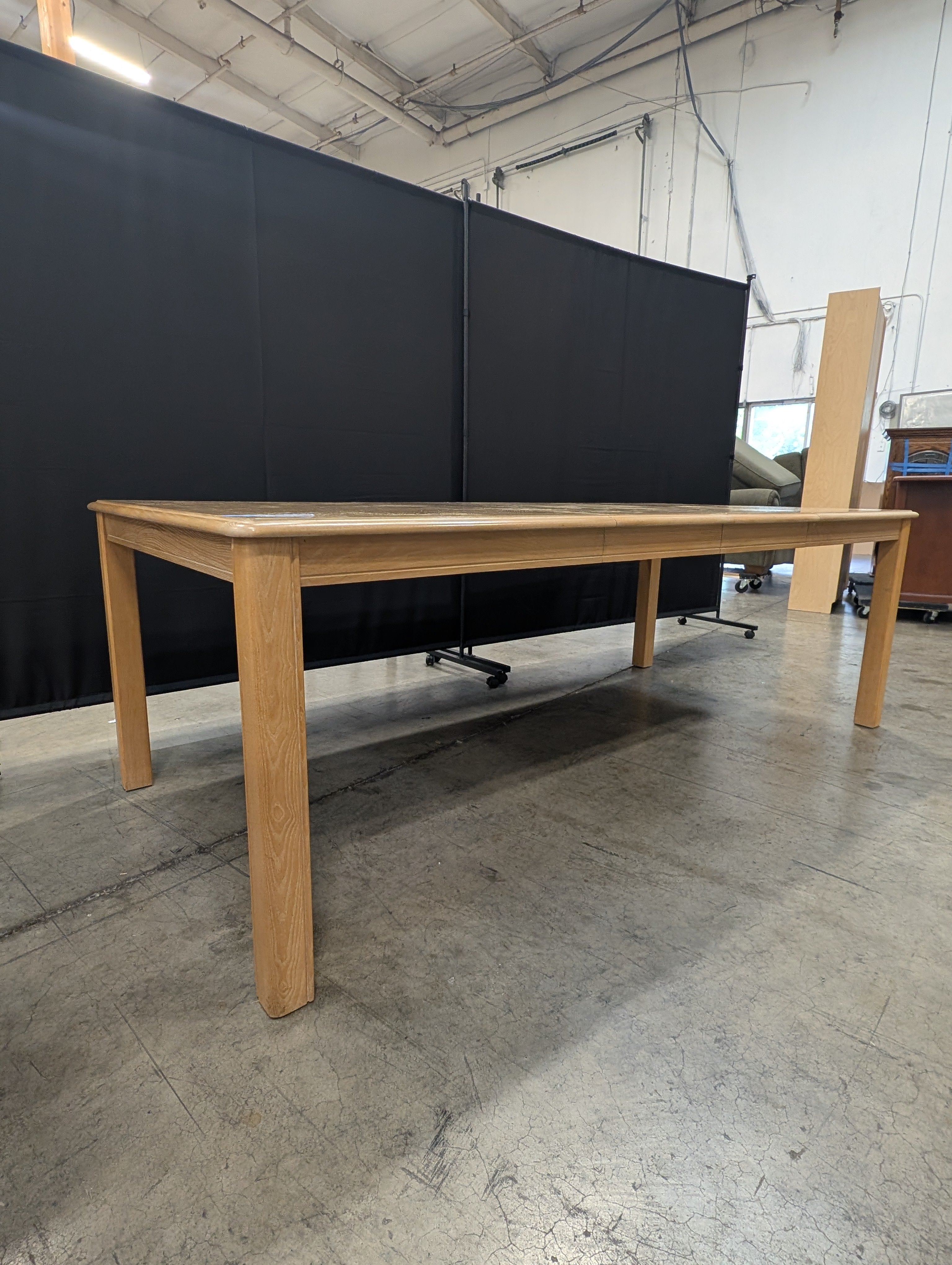 Rectangular Light Wood Dining Table with Sunburst Veneer Pattern