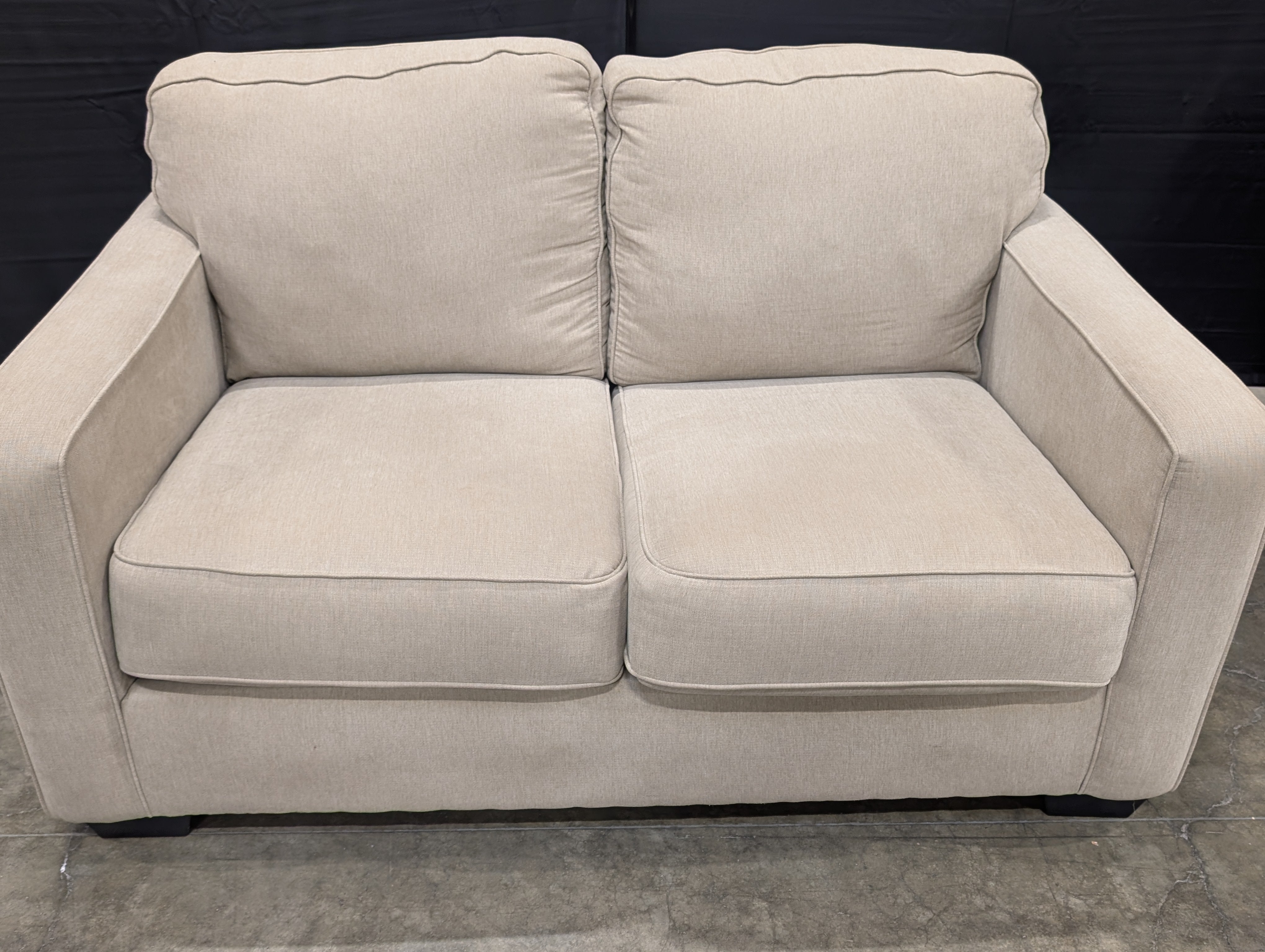 Ashley Furniture Neutral Fabric Two-Seater Sofa