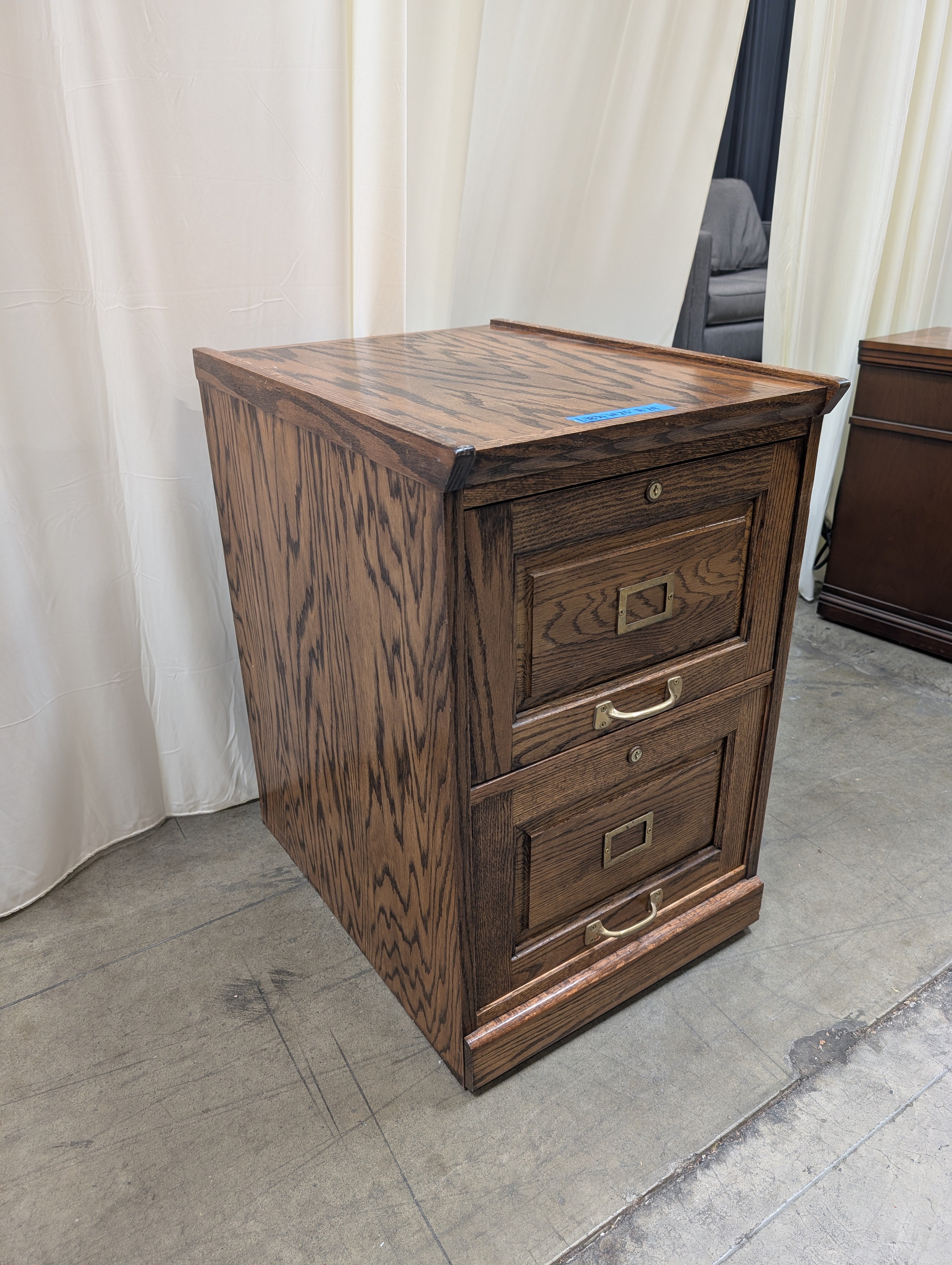 Dark Brown Wood Three-Drawer Filing Cabinet with Brass Hardware