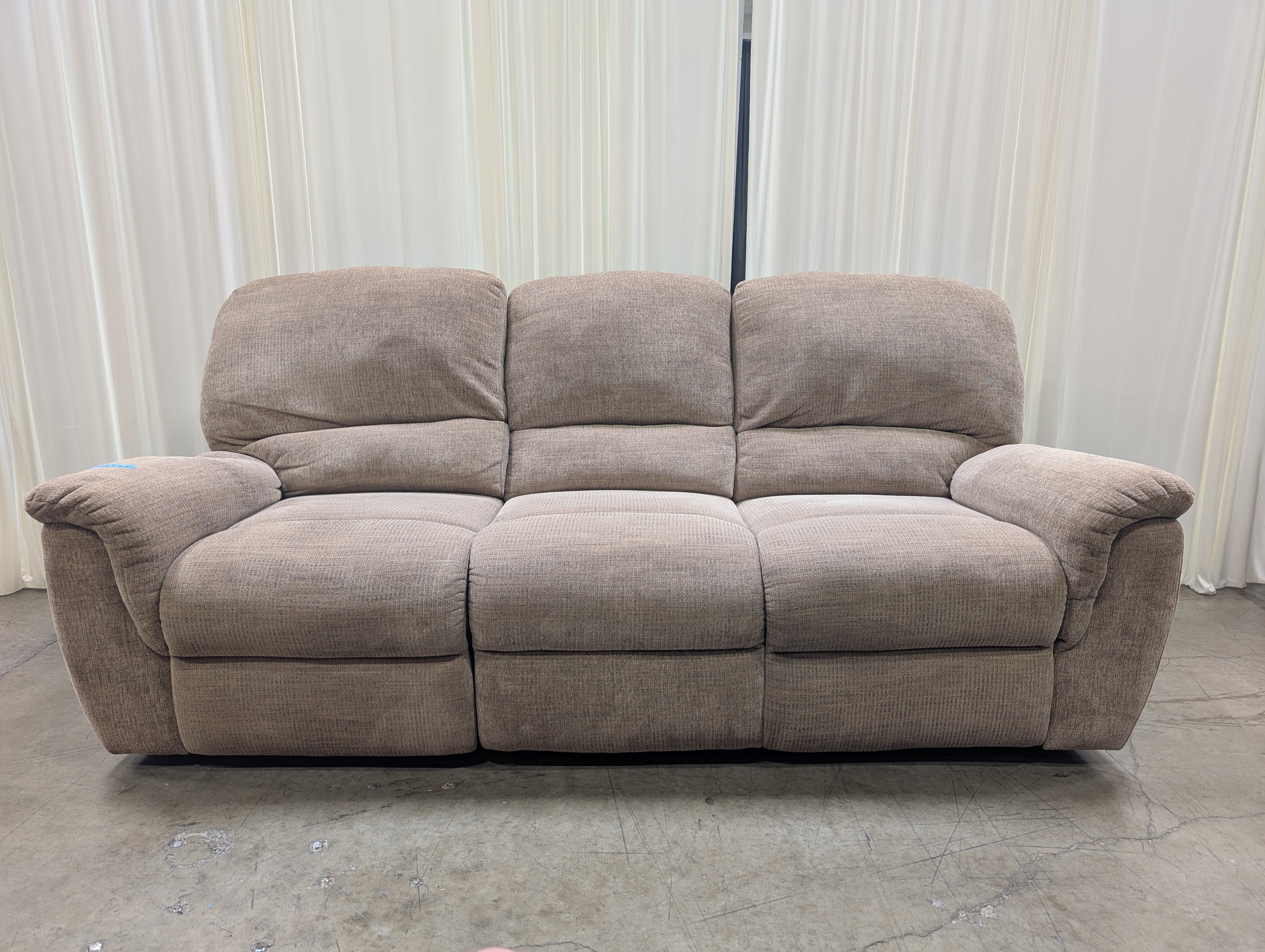 Tan Textured Fabric Reclining Couch