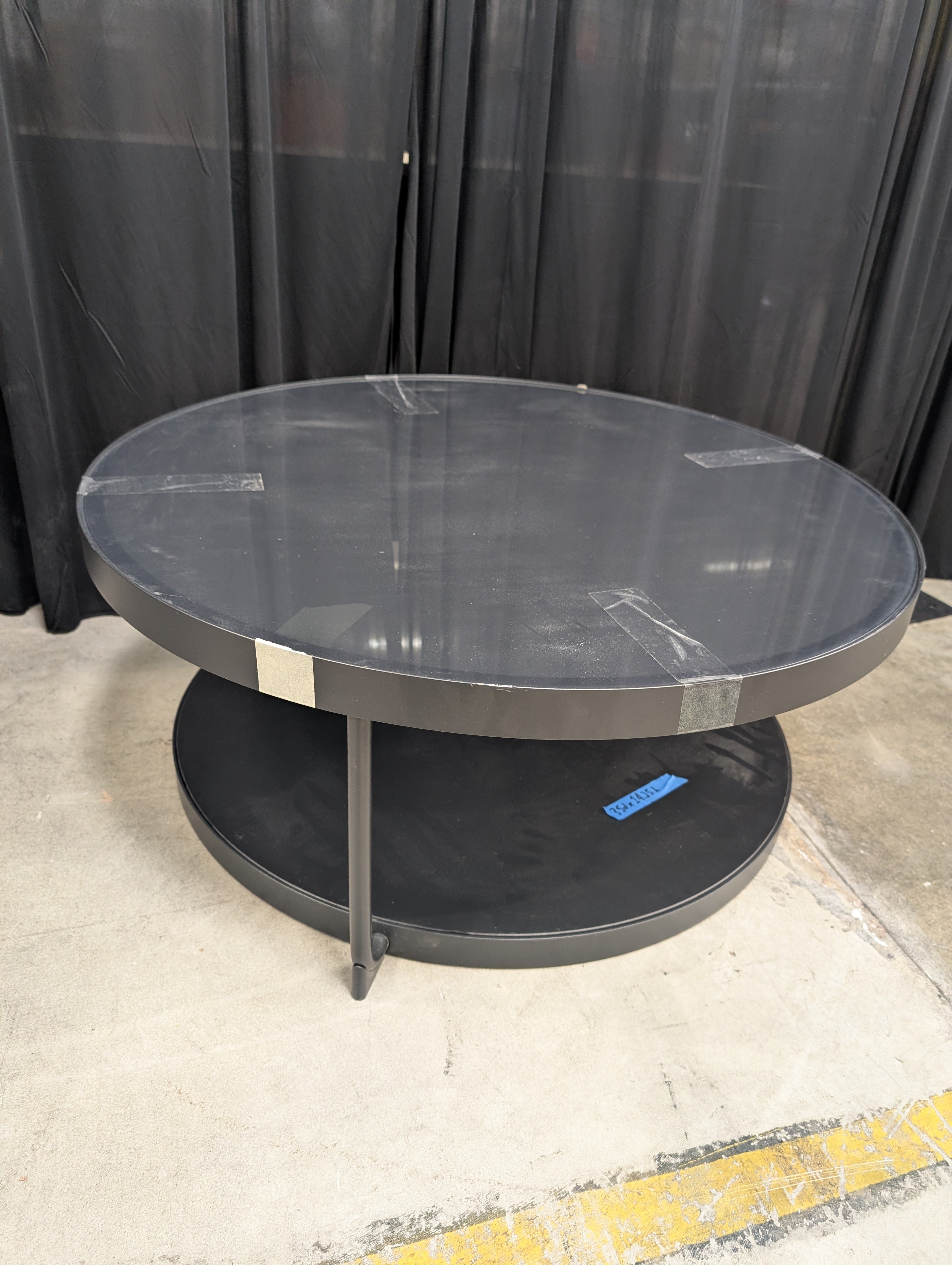 Round Glass top Coffee Table with Dark Metal Base