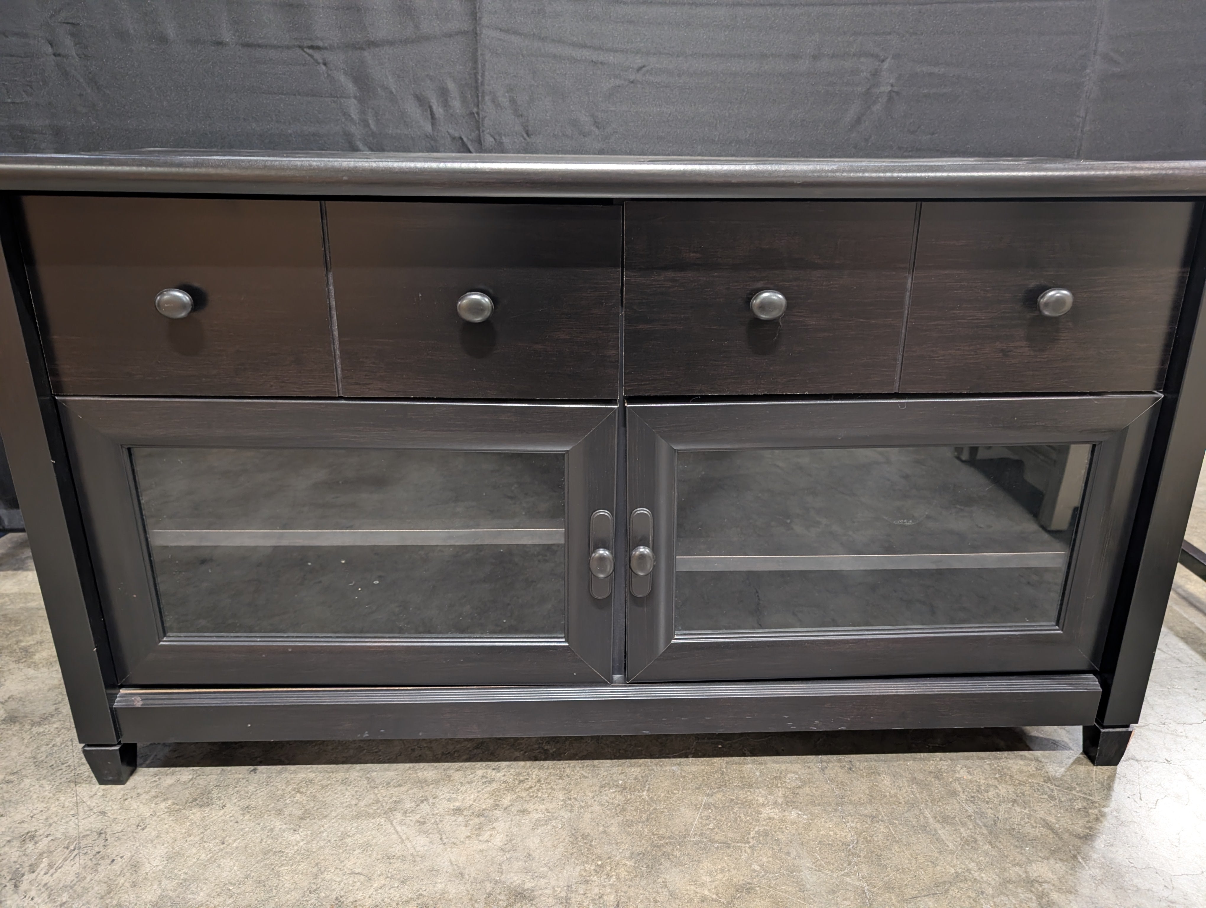 Black Wood Console Cabinet with Four Drawers and Glass Doors