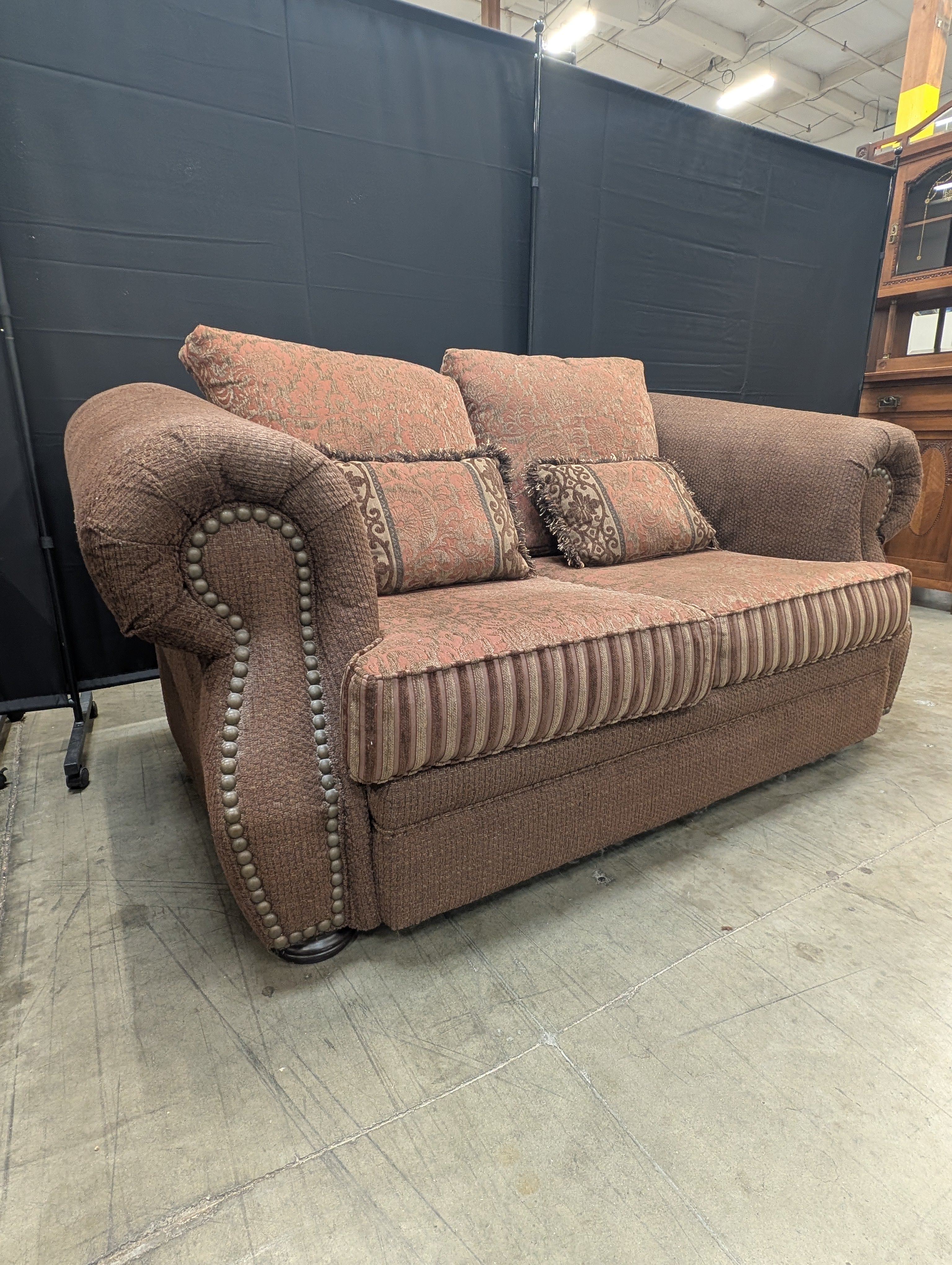 Textured Brown Loveseat with Nail Trim