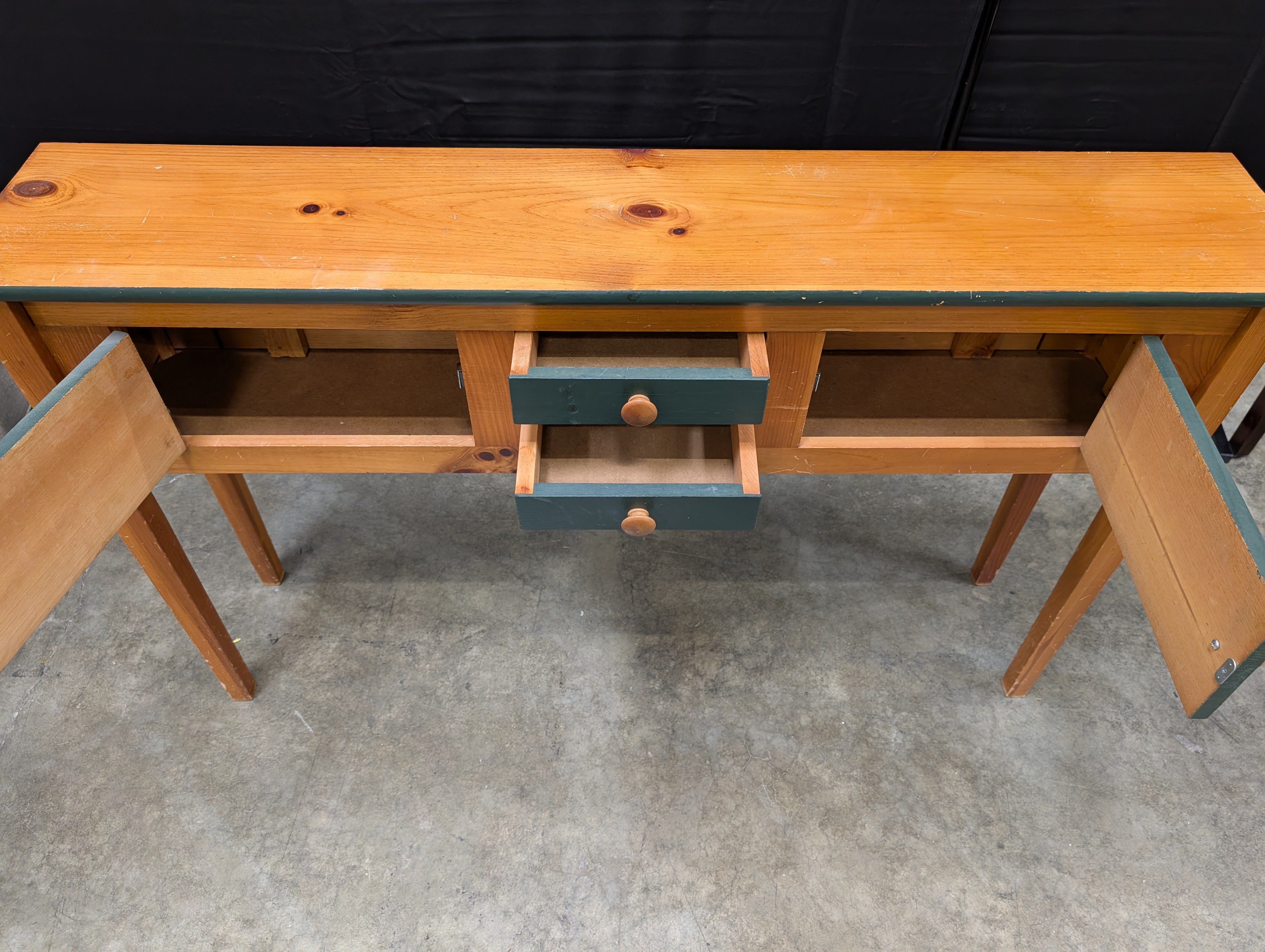 Rustic Wood Console Table with Dark Green Cabinetry