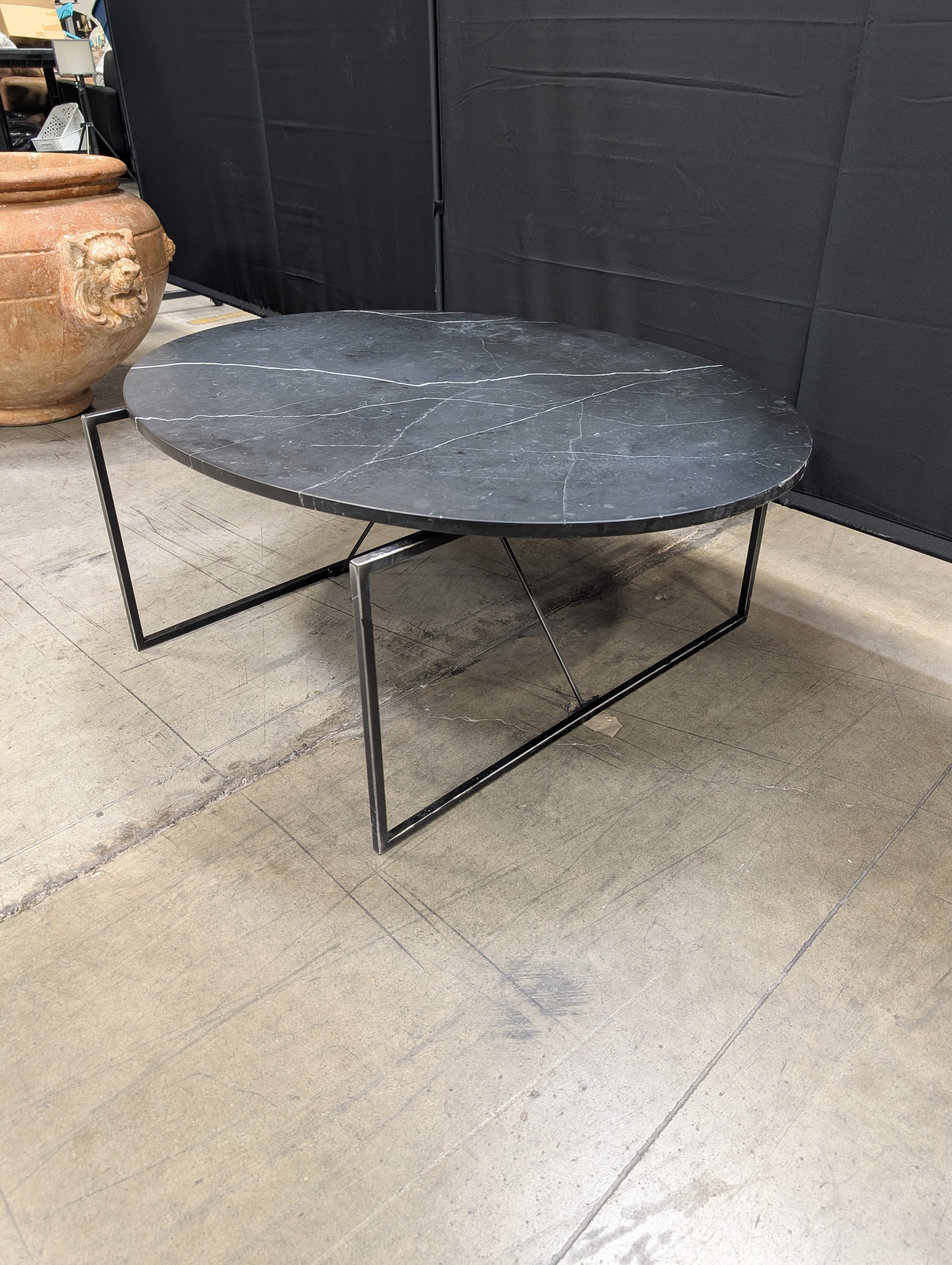 Modern Oval Stone Top Coffee Table with Geometric Metal Base