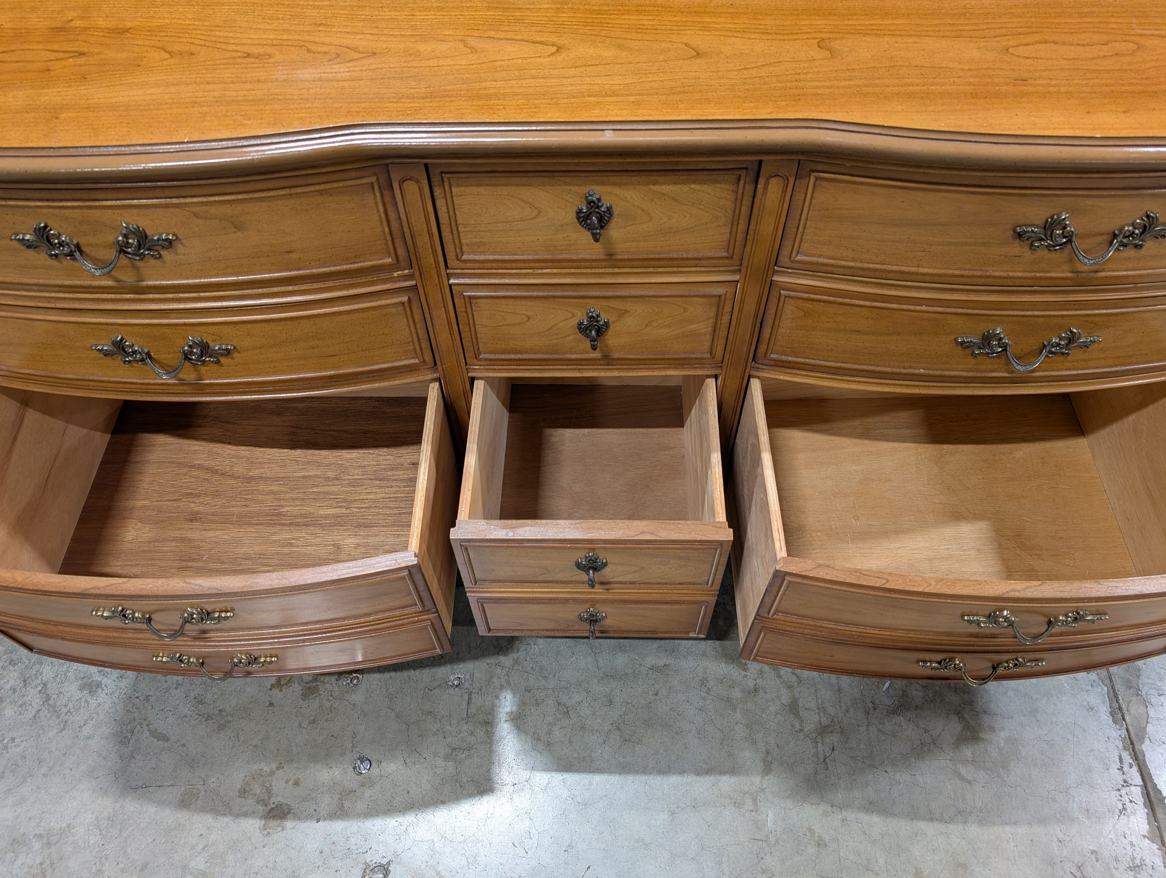 Vintage French Provincial Nine-Drawer Wood Dresser