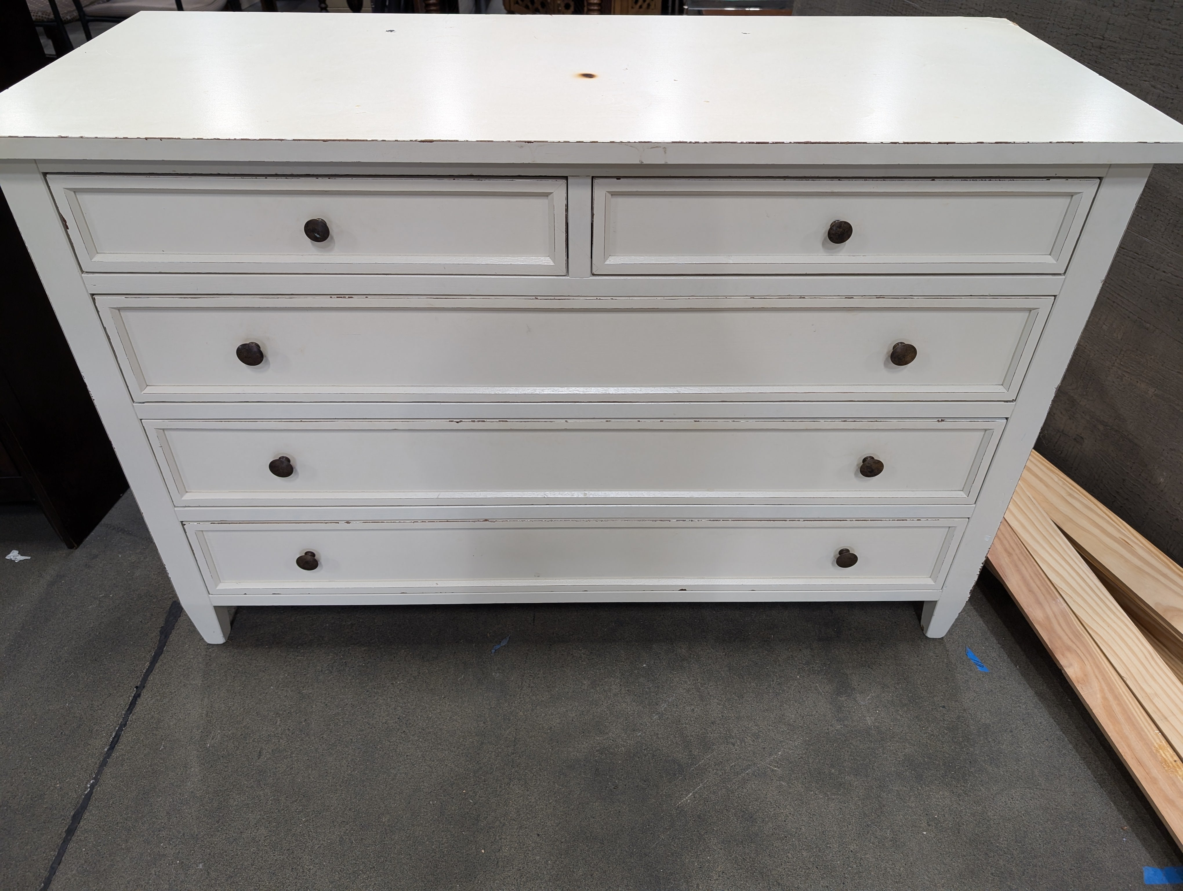 Distressed Off-White Five-Drawer Chest with Dark Knobs