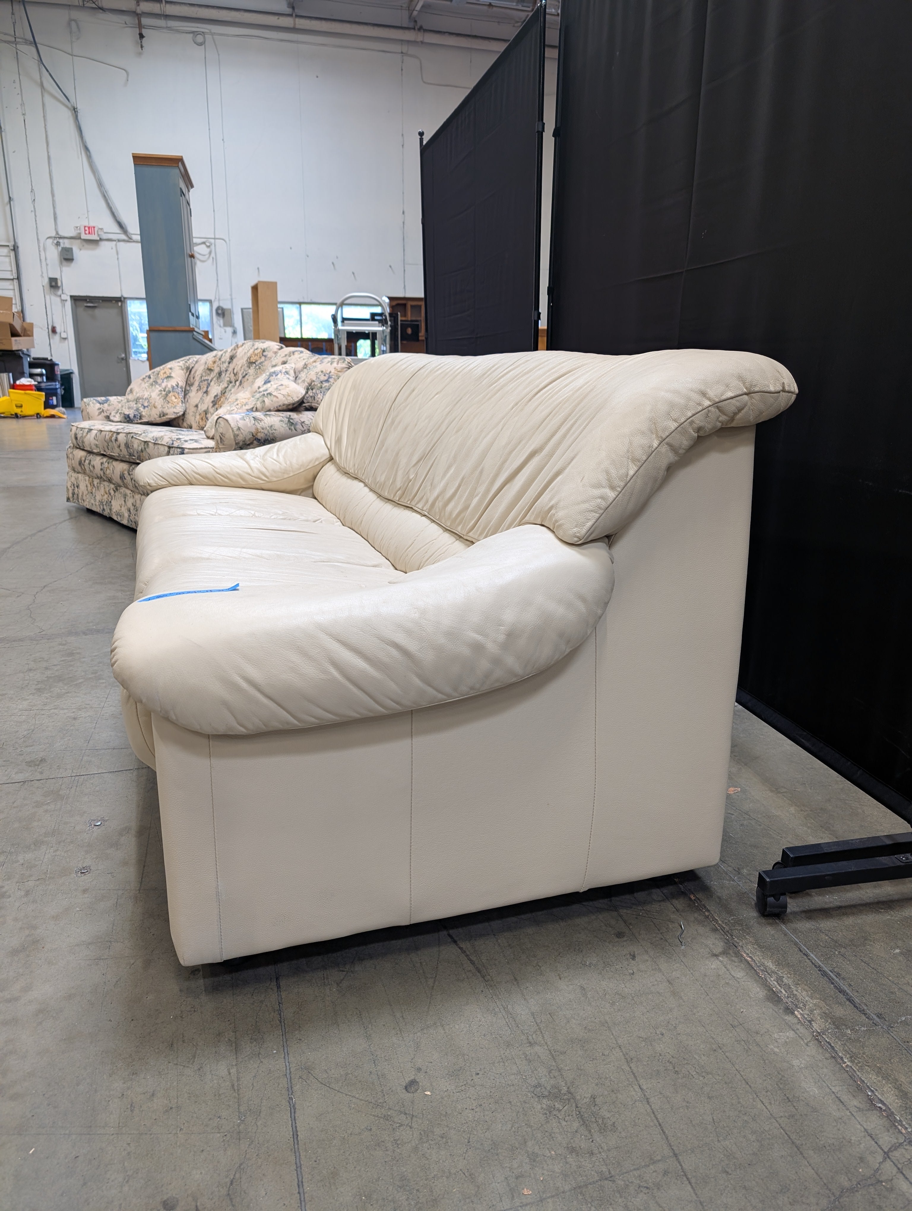 Cream Natuzzi Three-Seater Upholstered Sofa