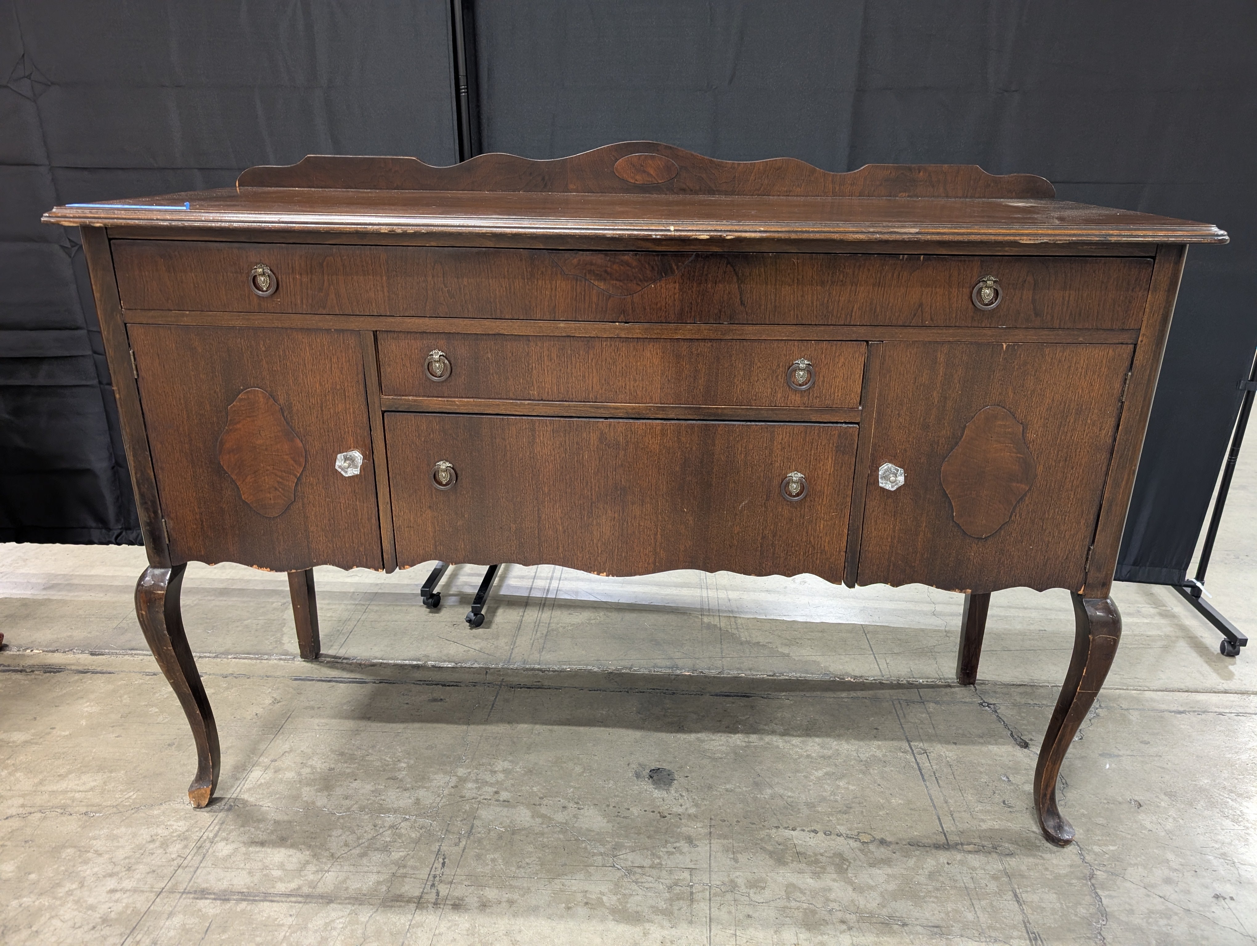 Traditional Dark Wood Buffet Cabinet with Scalloped Back