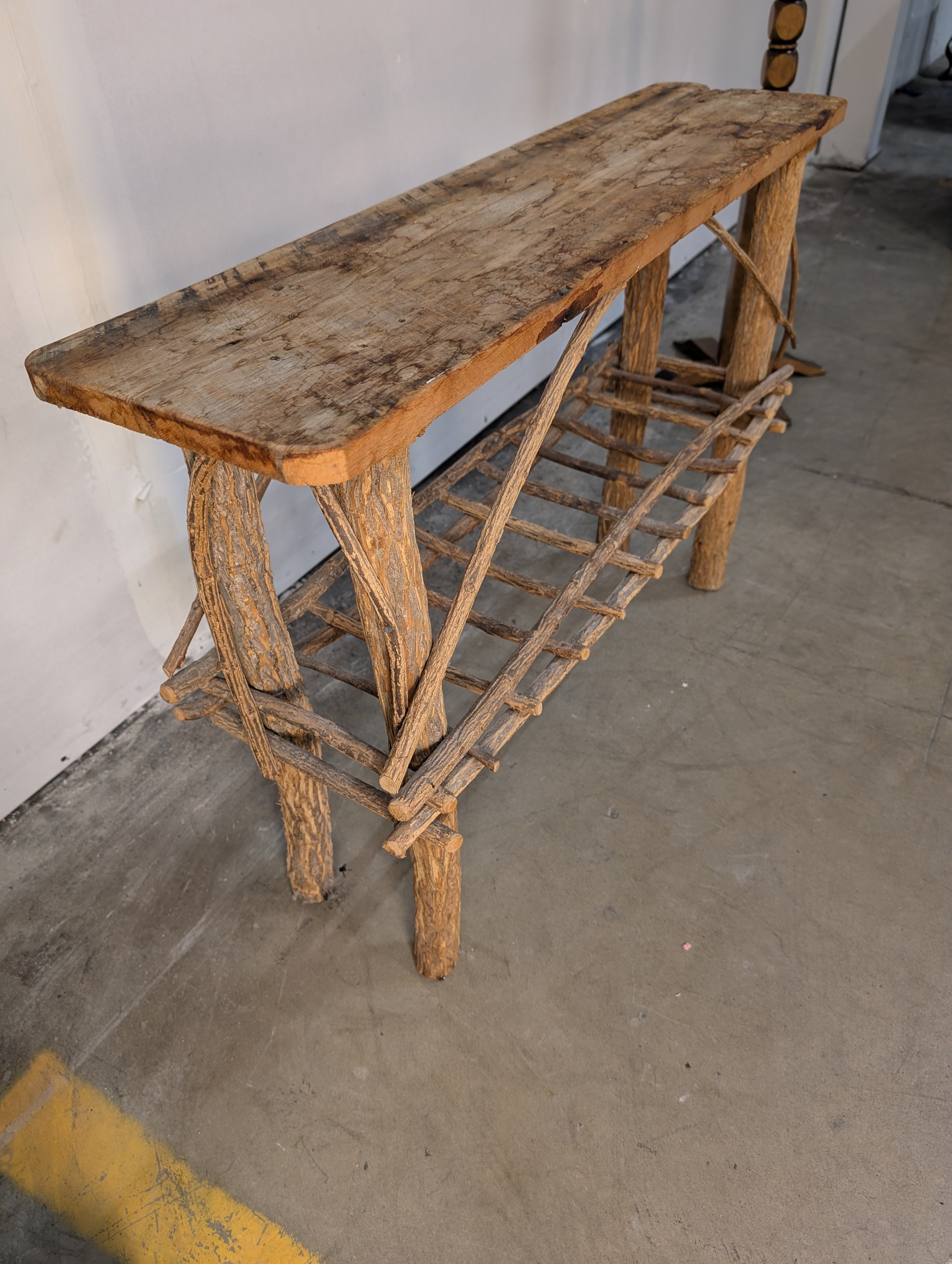 Rustic Natural Wood Plank Console Table with Twig Base