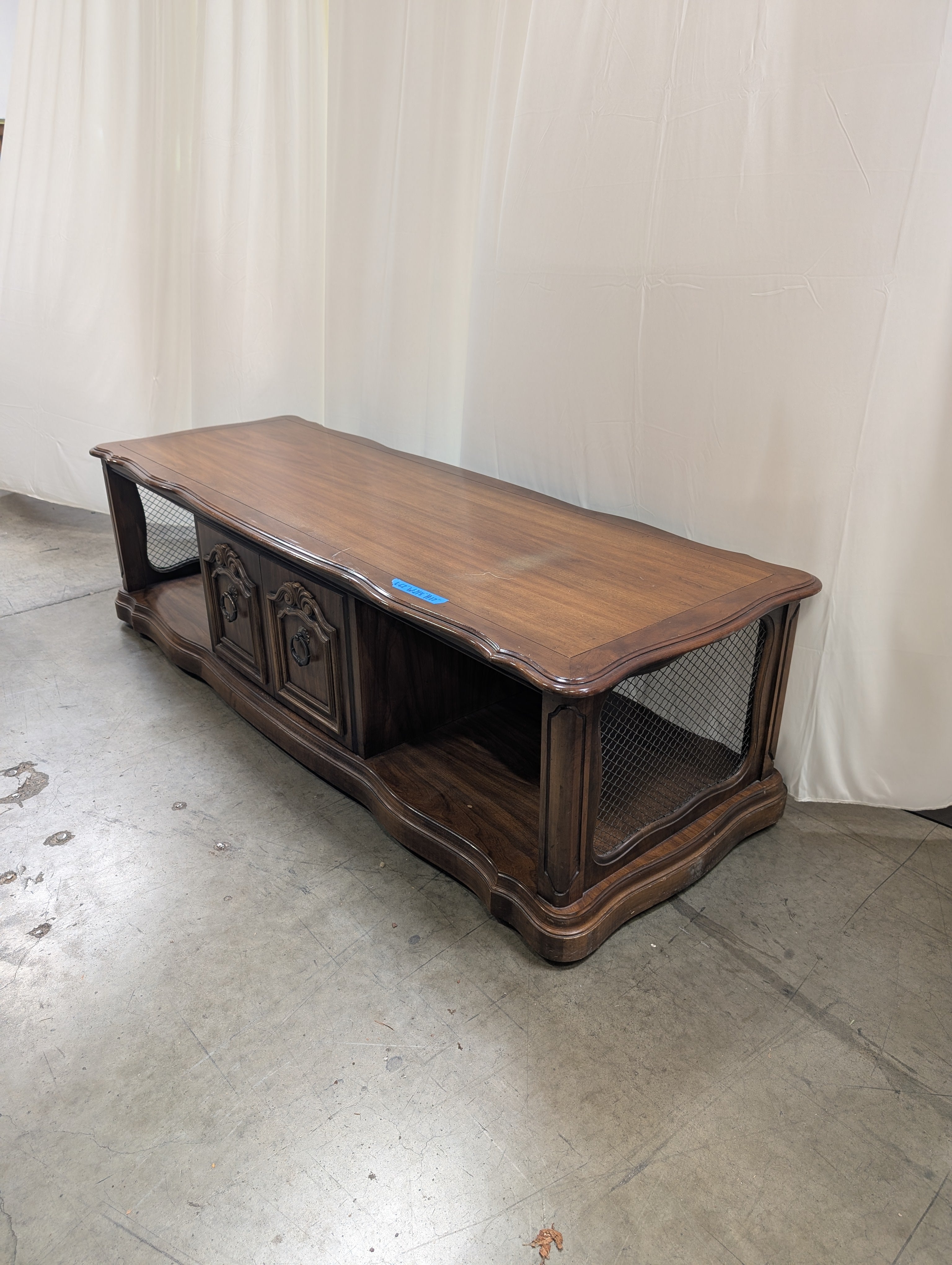 Traditional Dark Wood Coffee Table with Ornate Hardware