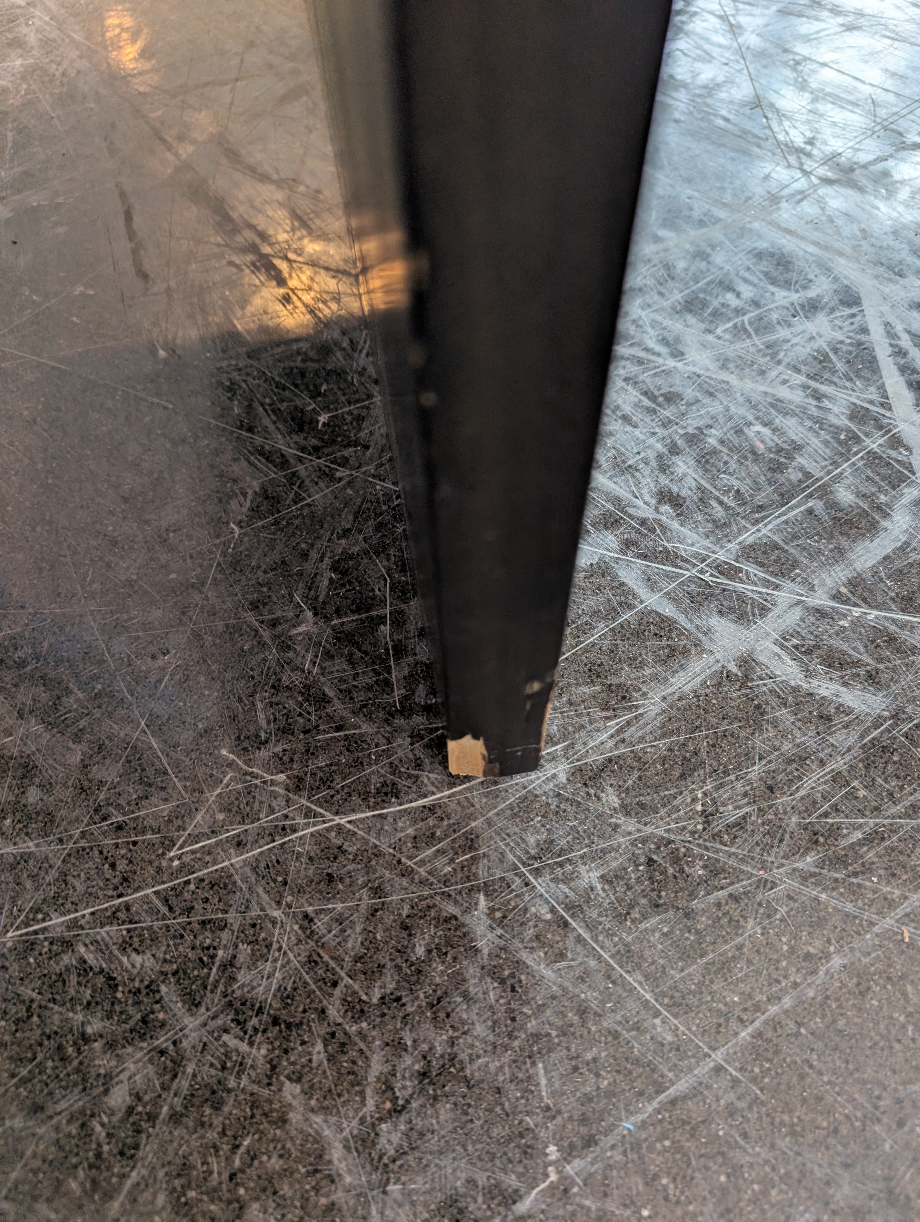 Two Dark Brown Stained Wood Boards