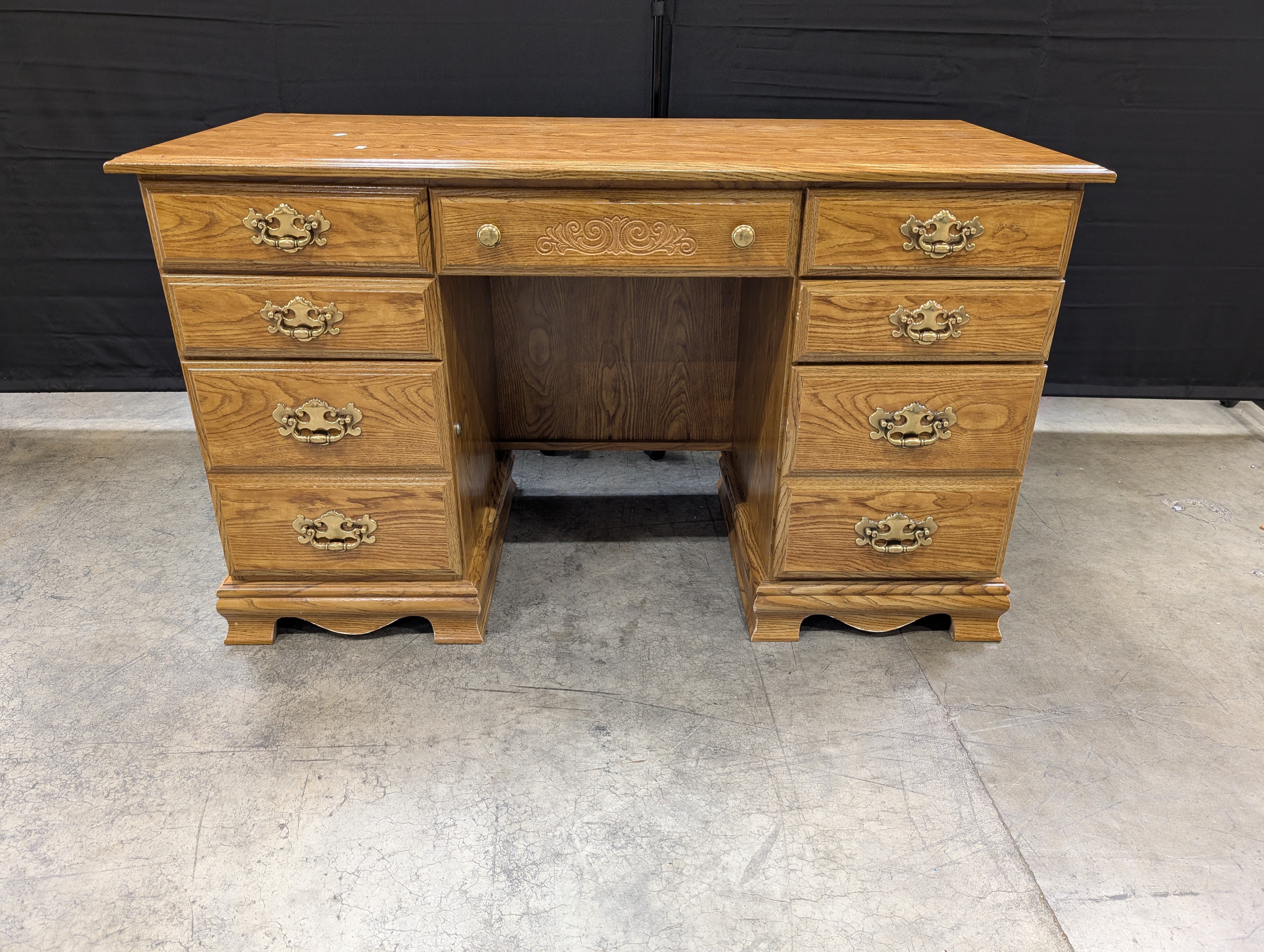 Traditional Oak Finish Pedestal Desk with Brass Pulls