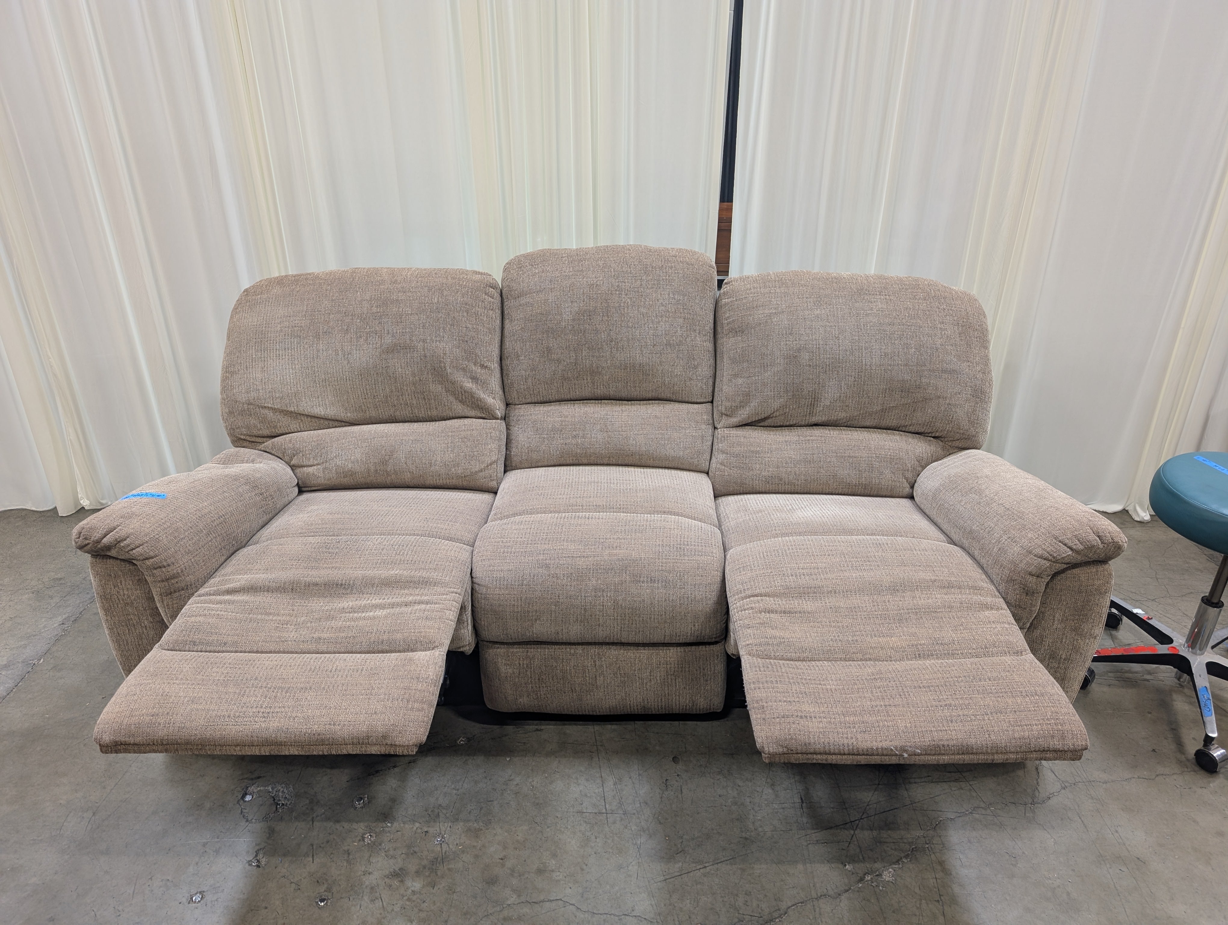 Tan Textured Fabric Reclining Couch
