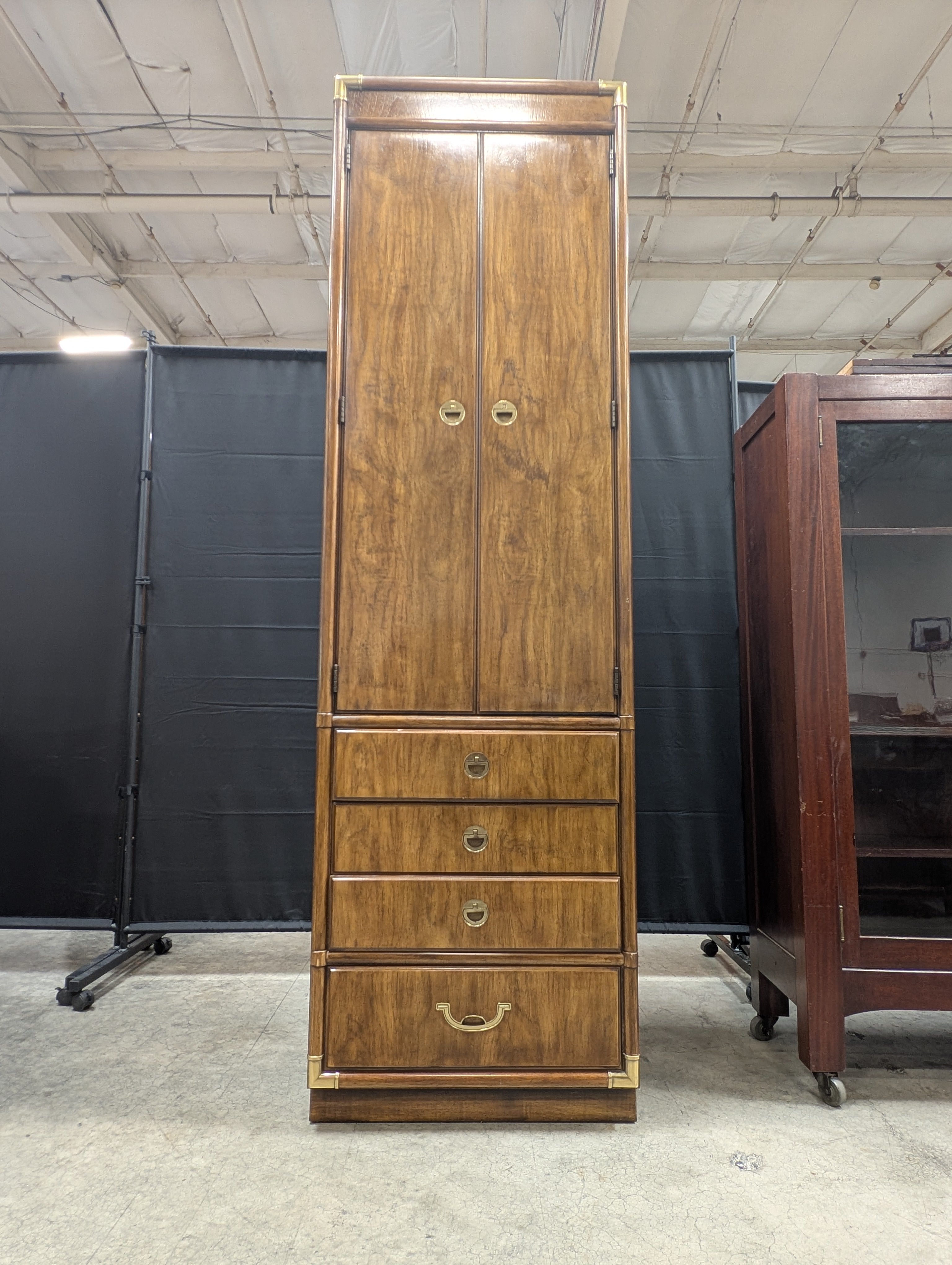 Tall Wooden Drexel Cabinet with Brass Accents and Multiple Drawers