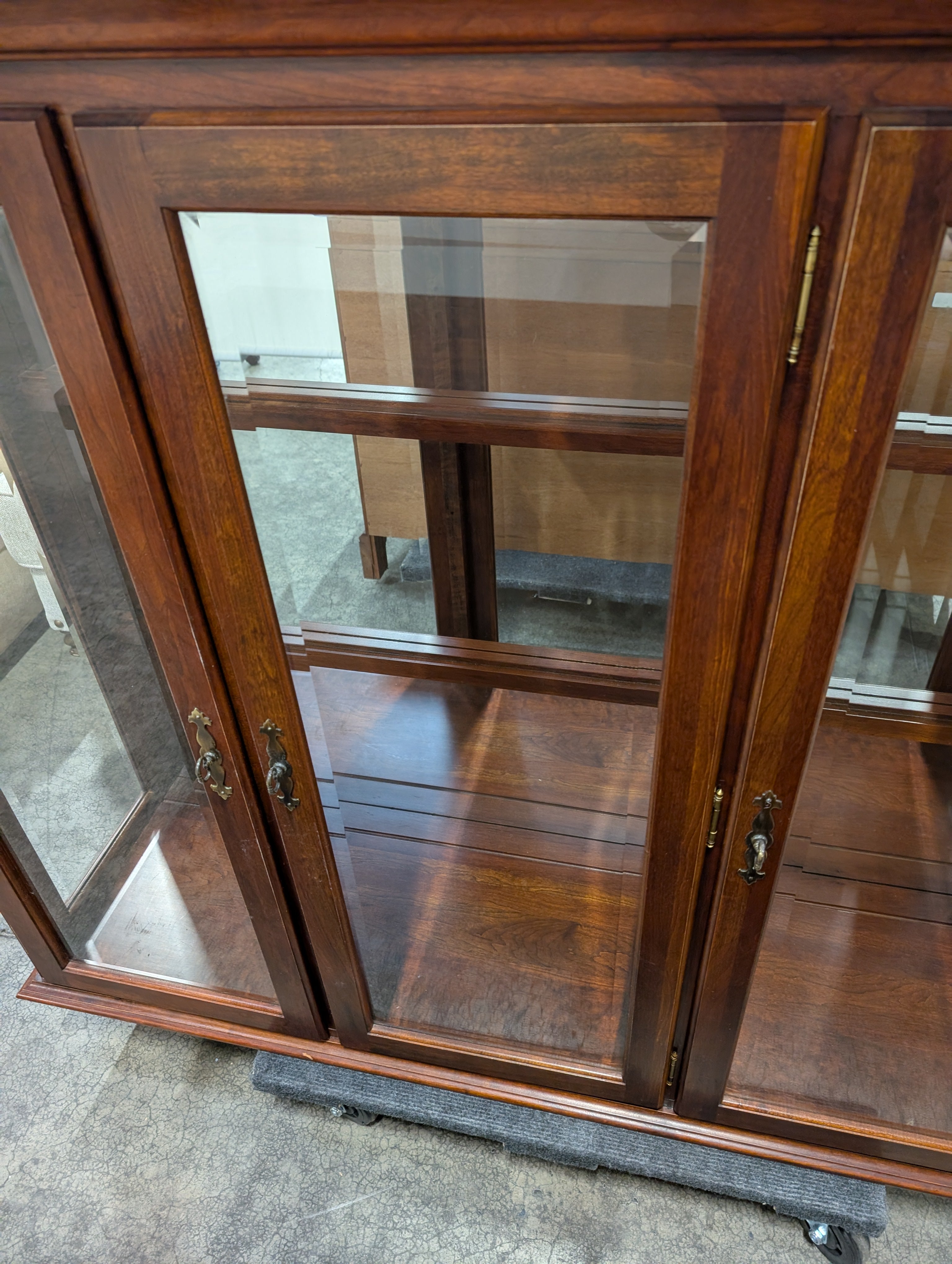 Richly Stained Wooden Display Cabinet with Glass Doors