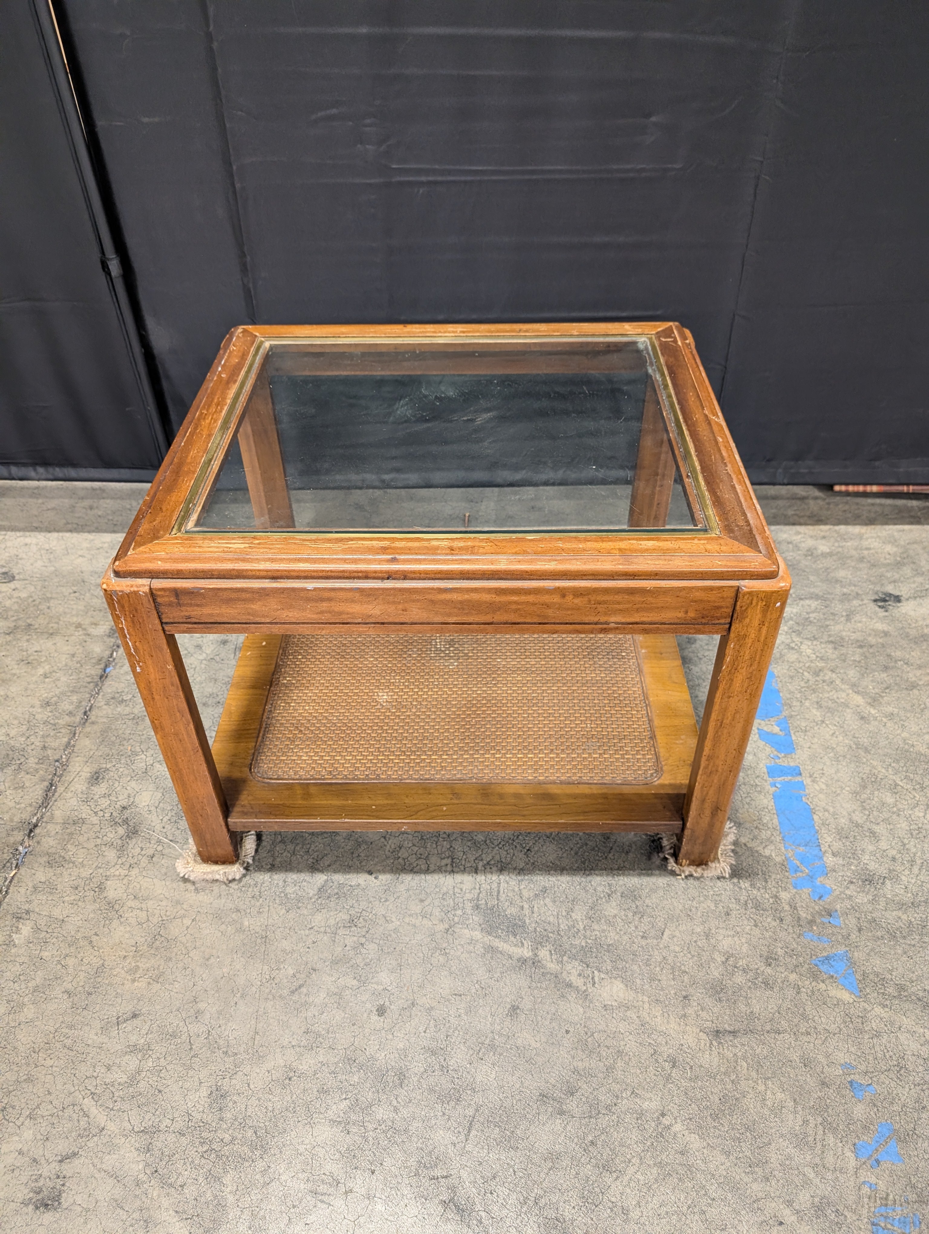 Brown Wood and Glass End Table with Wicker Shelf