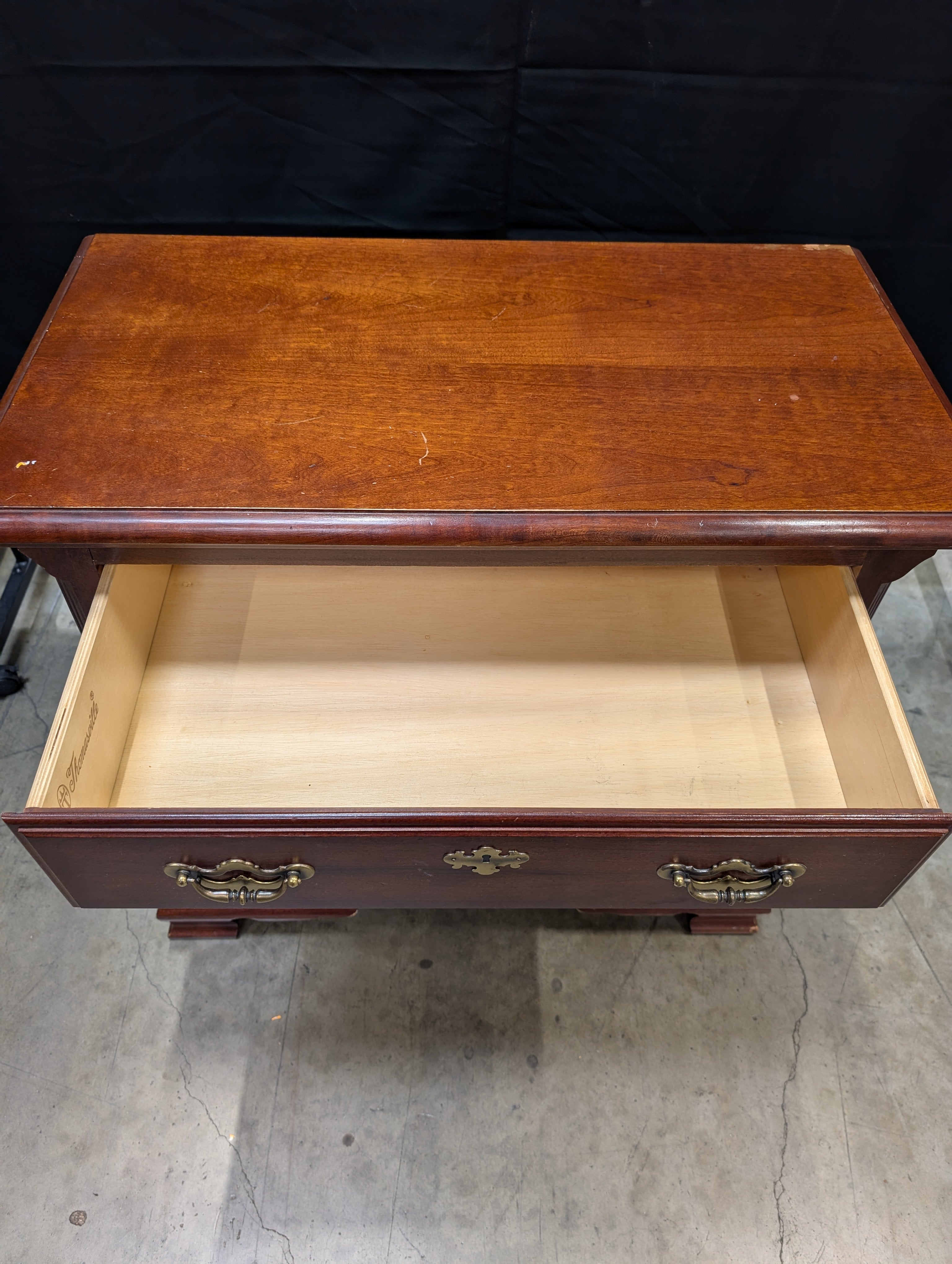 Traditional Reddish Brown Wood Accent Cabinet with Ornate Hardware