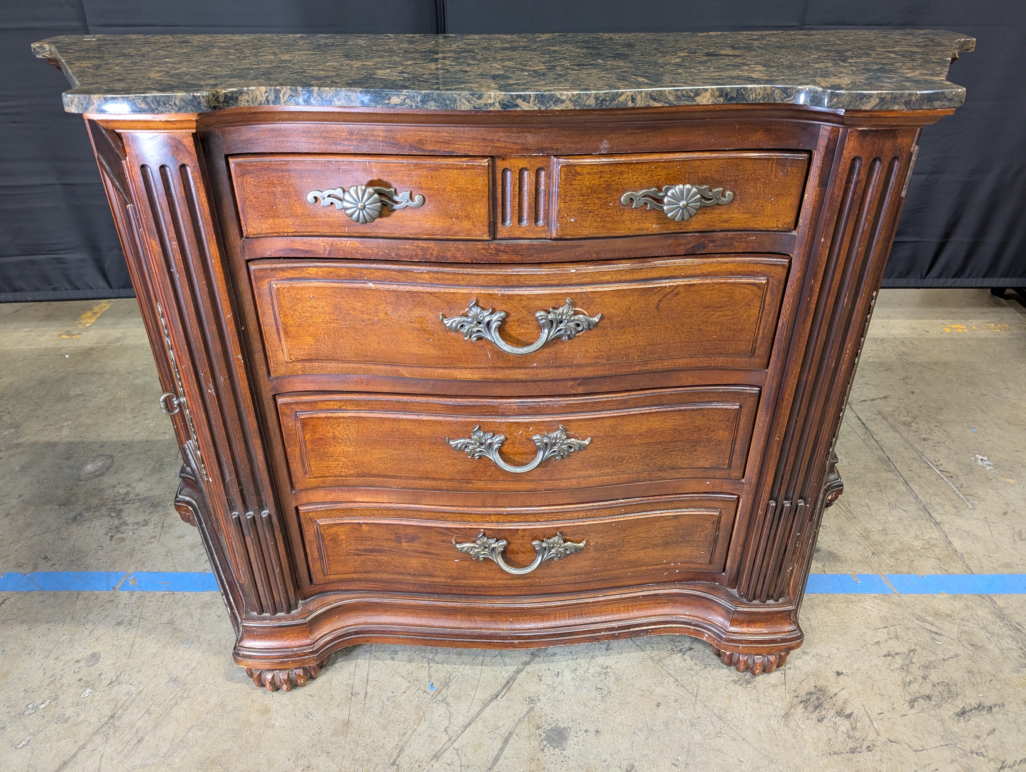 Traditional Cherry Stained Wood Dresser with Ornate Hardware