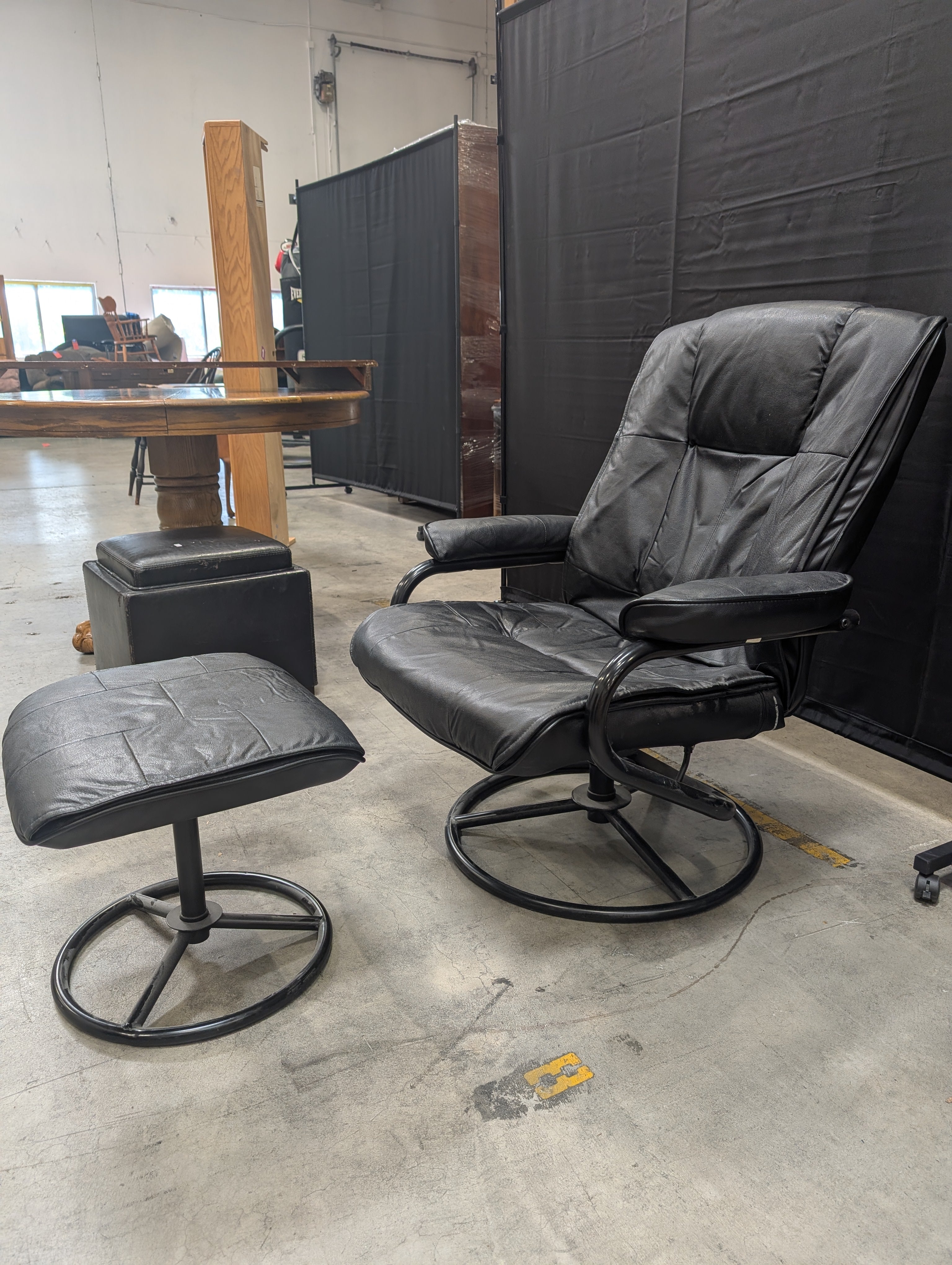 Padded Black Recliner with Ottoman